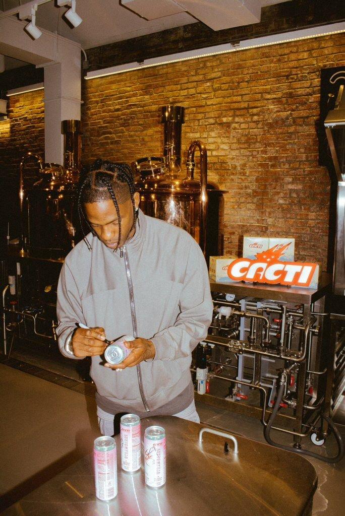 Travis Scott signing cans