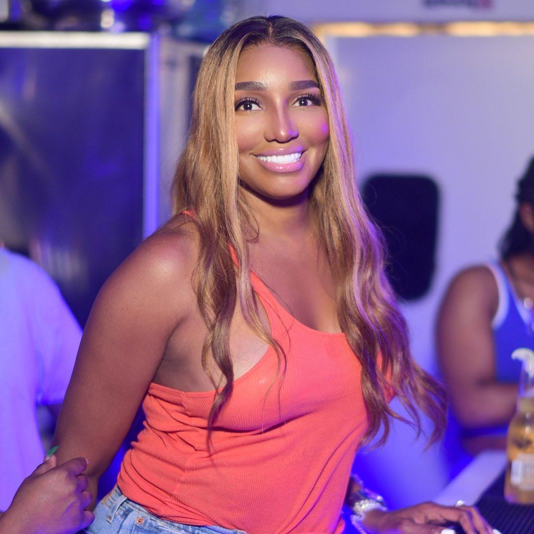 Nene Leakes in a pink top.