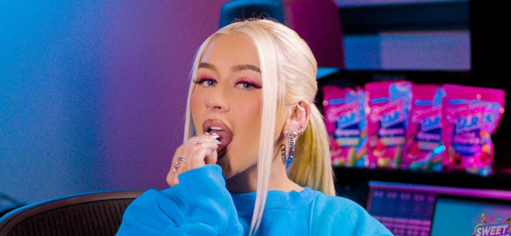 Christina Aguilera eating SweeTARTS out of her Grammy