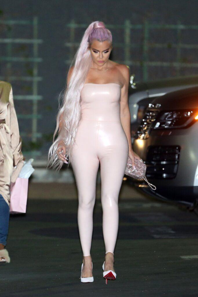 Khlo Kardashian wears a tight pink leather dress as she leaves Goya Studios