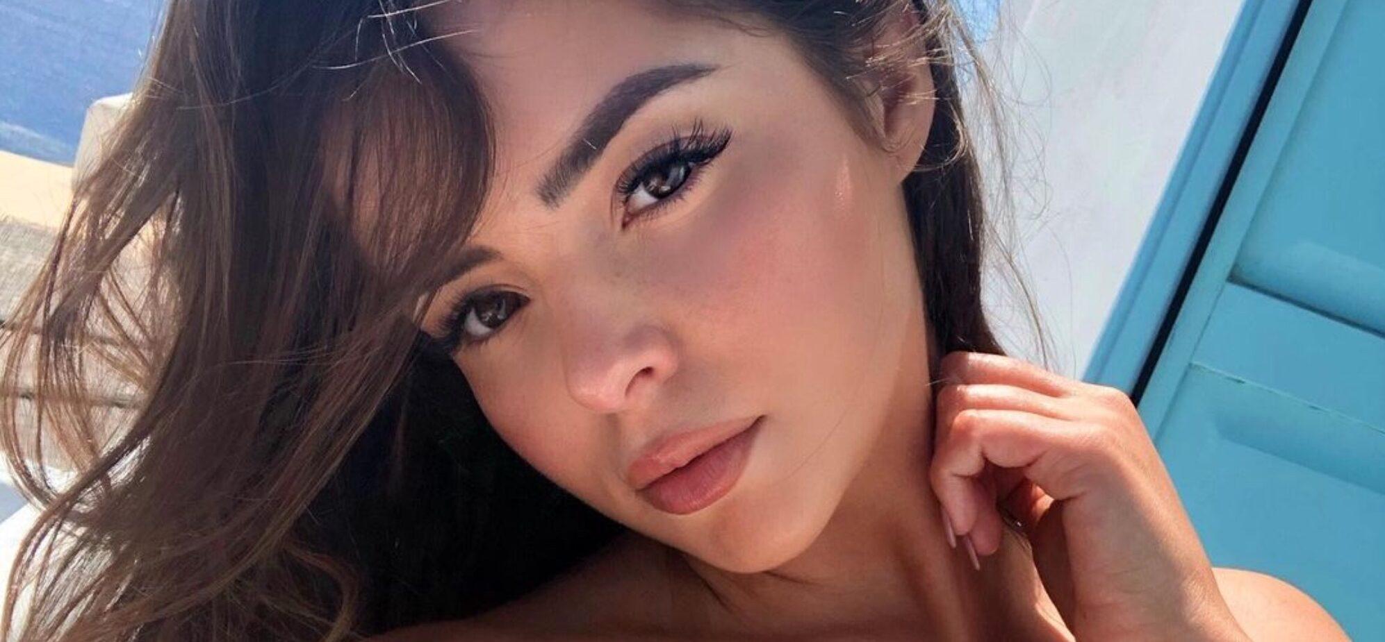 Demi Rose Shows Off Eye-Popping Cleavage Underneath Sheer Robe
