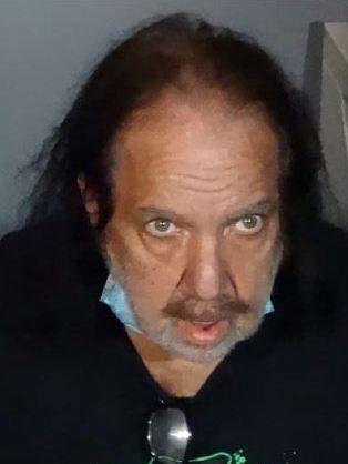 Porn star Ron Jeremy in mugshot after sexual assault charges as cops seek more women to come forward