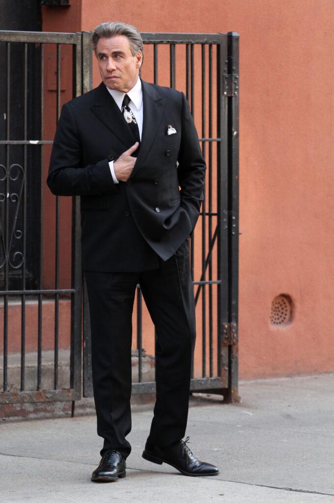John Travolta looks dapper in a suit while filming GOTTI in New York City