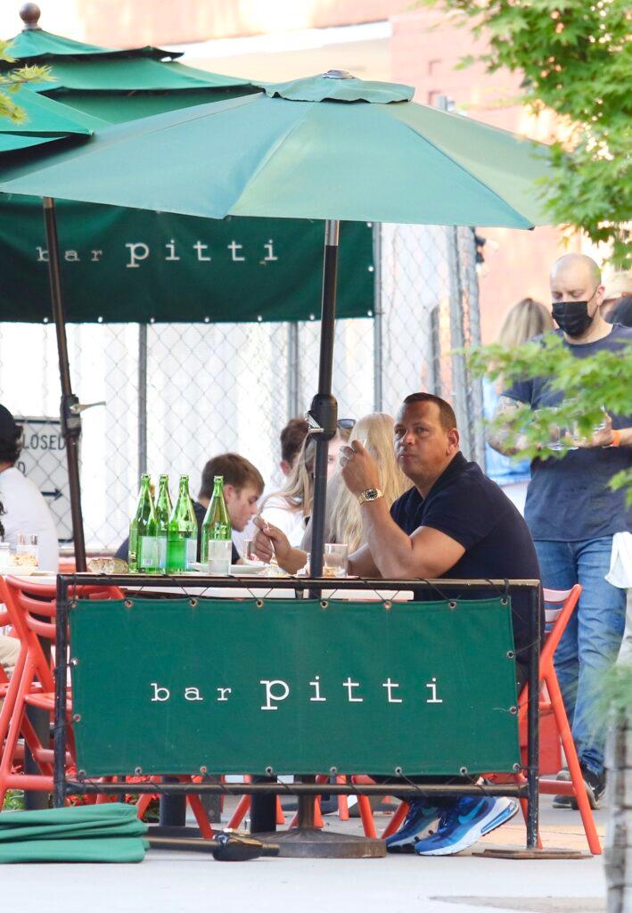 Alex Rodriguez looks sad as he eats alone at Bar Pitti Restaurant in NYC