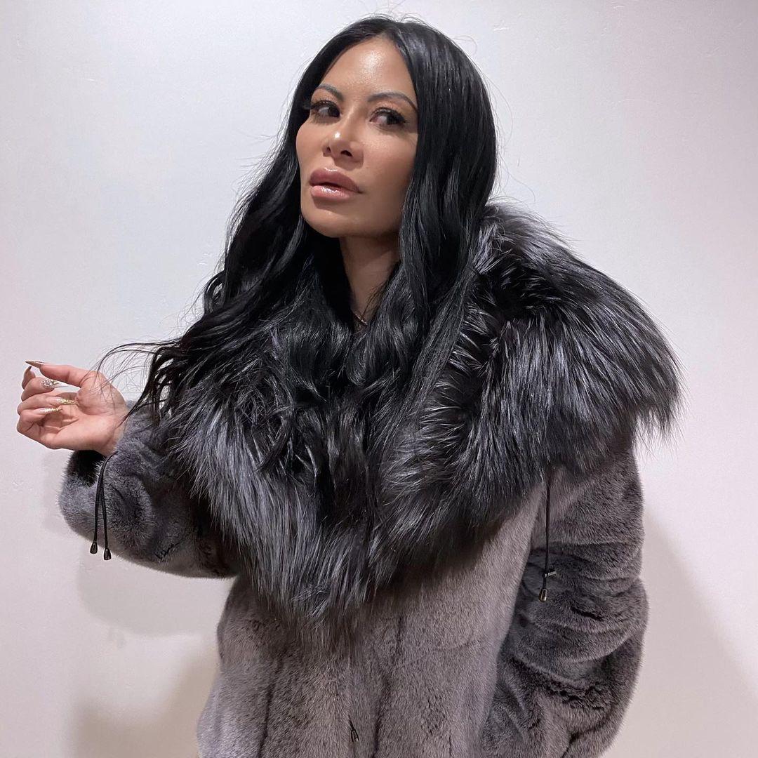 A photo of Jen Shah in a gray fur coat, and she looks gorgeous.