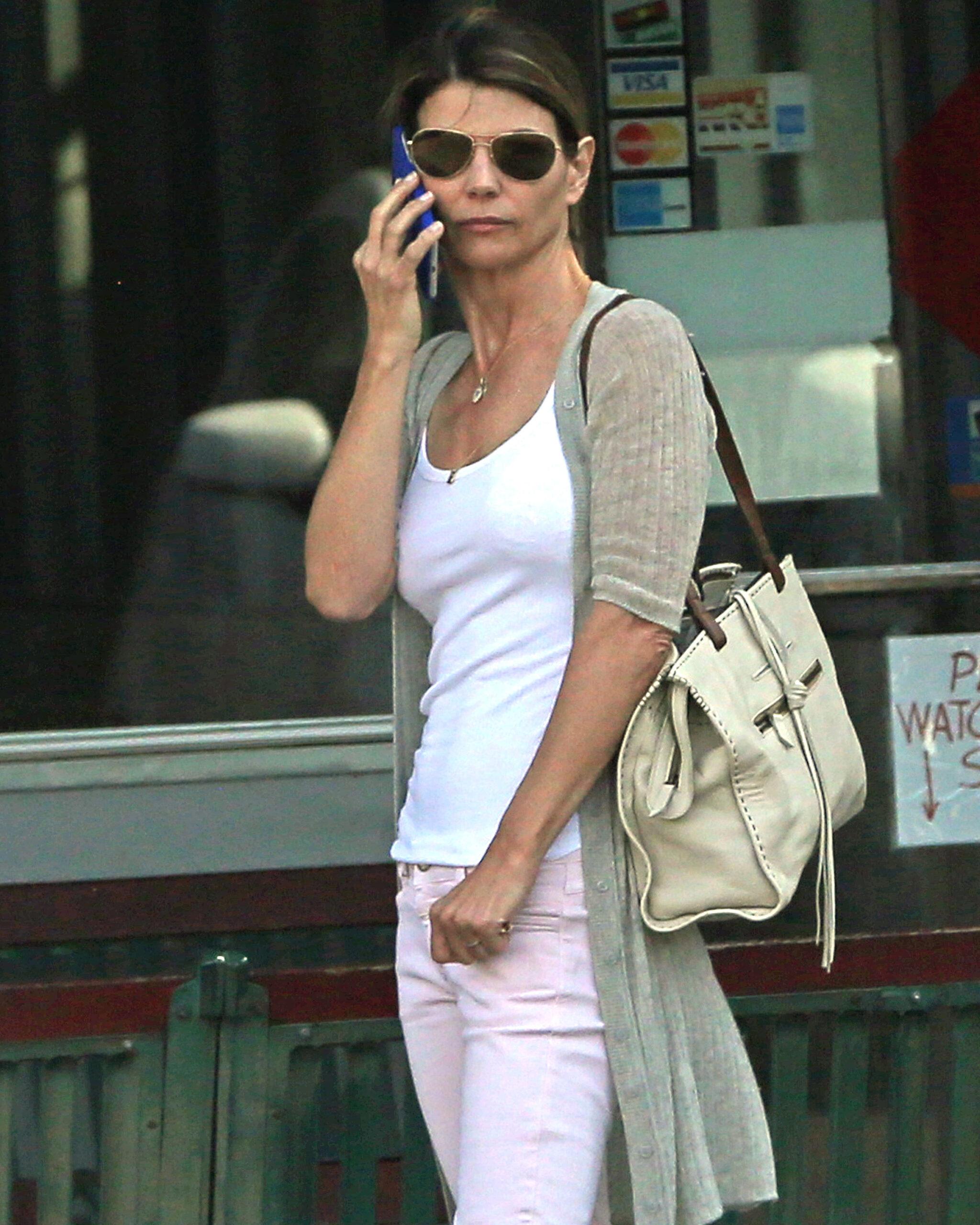Lori Loughlin takes her car to the car wash in West Hollywood, CA