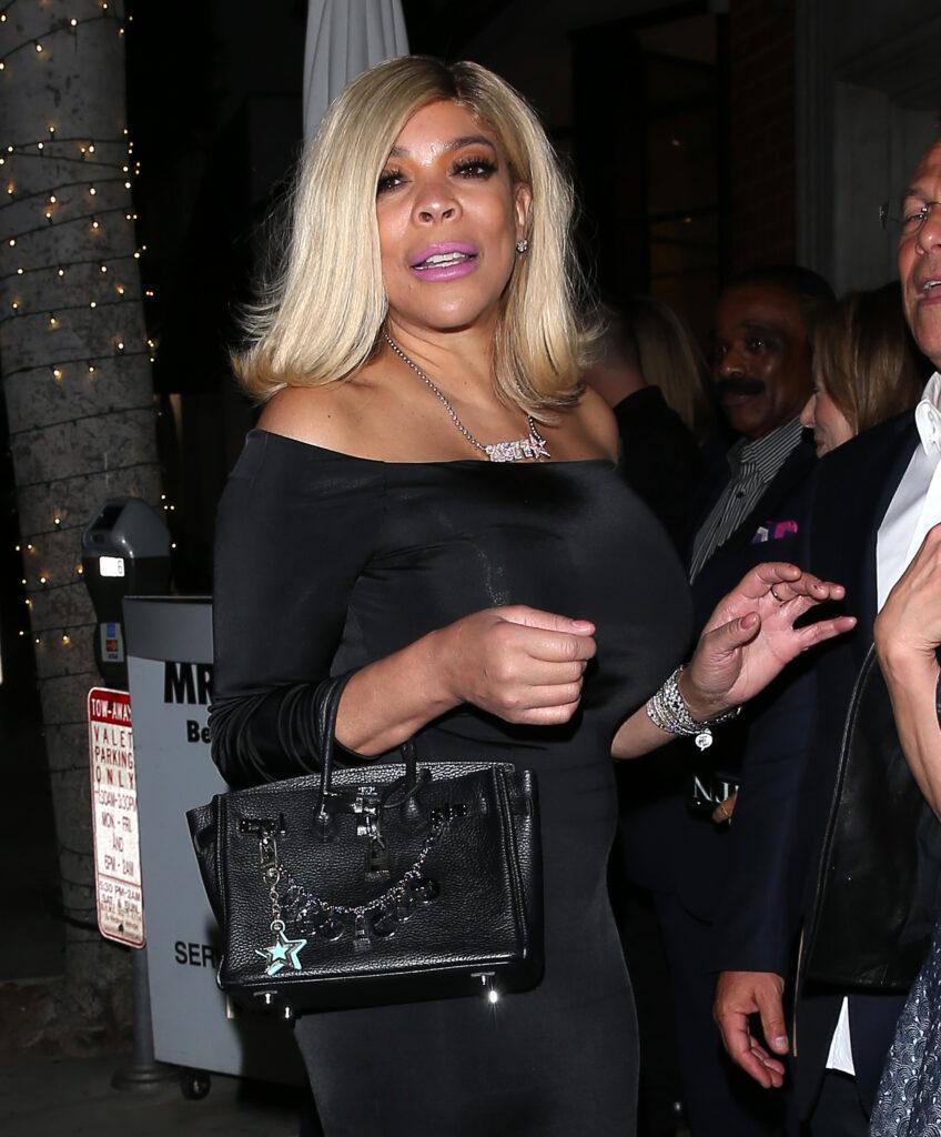 Wendy Williams was seen leaving dinner on the arms of Two men at Mr Chow Restaurant in Beverly Hills, CA