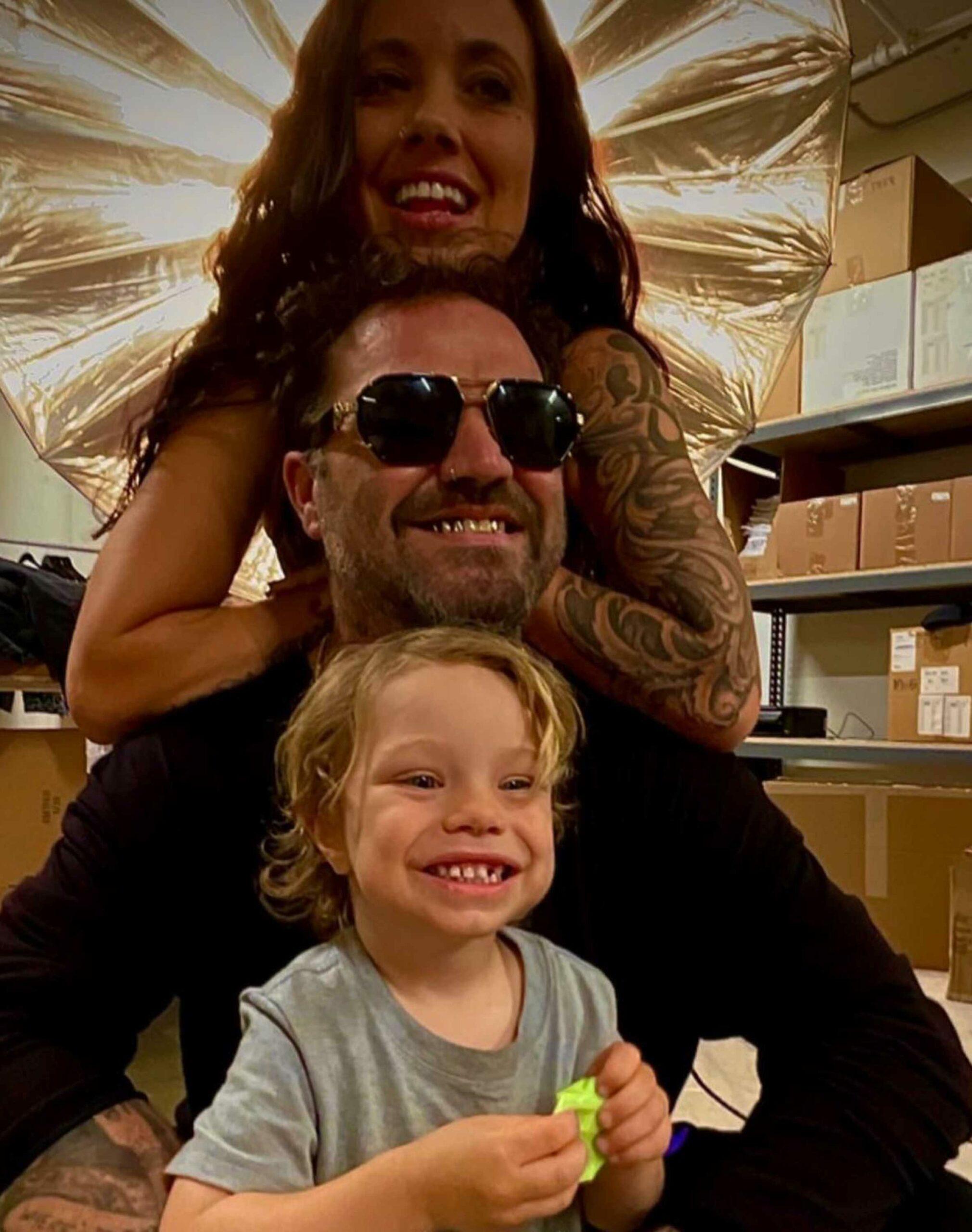 Bam Margera, his wife, and son.