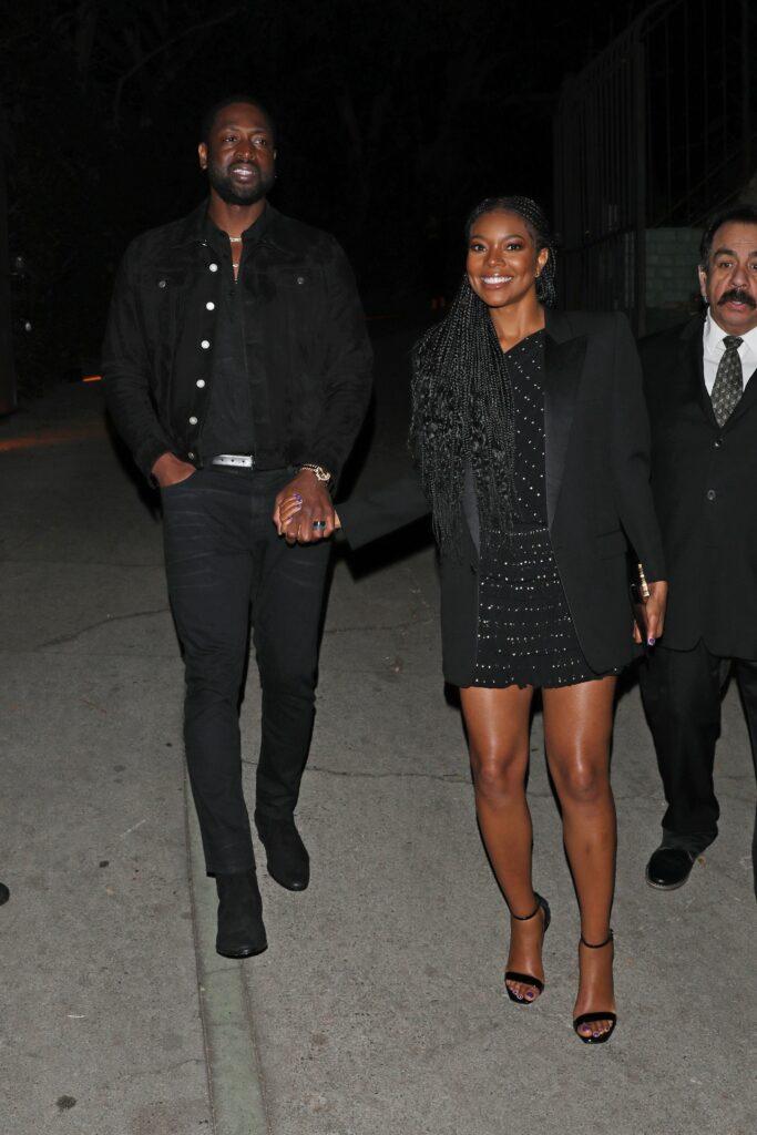 Dwyane Wade and Gabrielle Union are all smiles as they leave a pre Golden Globes party