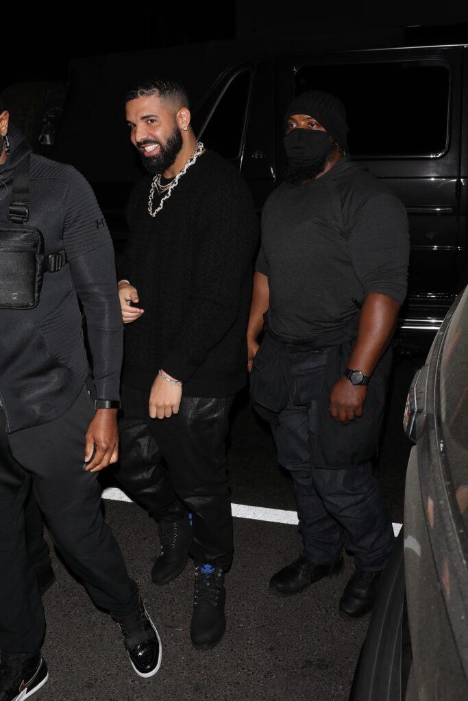 Rapper Drake is all smiles as he heads to the Nice Guy Restaurant to party