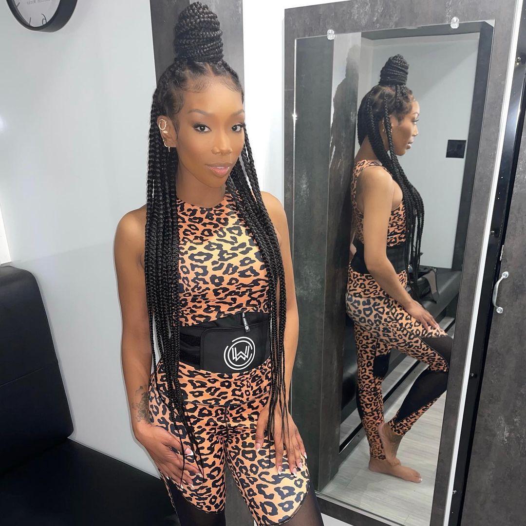 Brandy looks amazing in this photo showing her rocking an animal-print jumpsuit. 