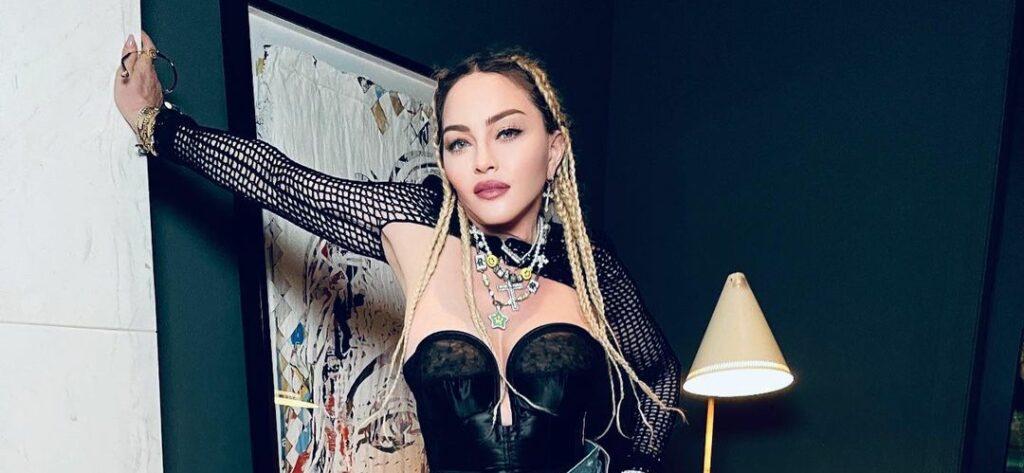 Madonna looks amazing in this photo showing her sporting a strapless leather-design bralette.