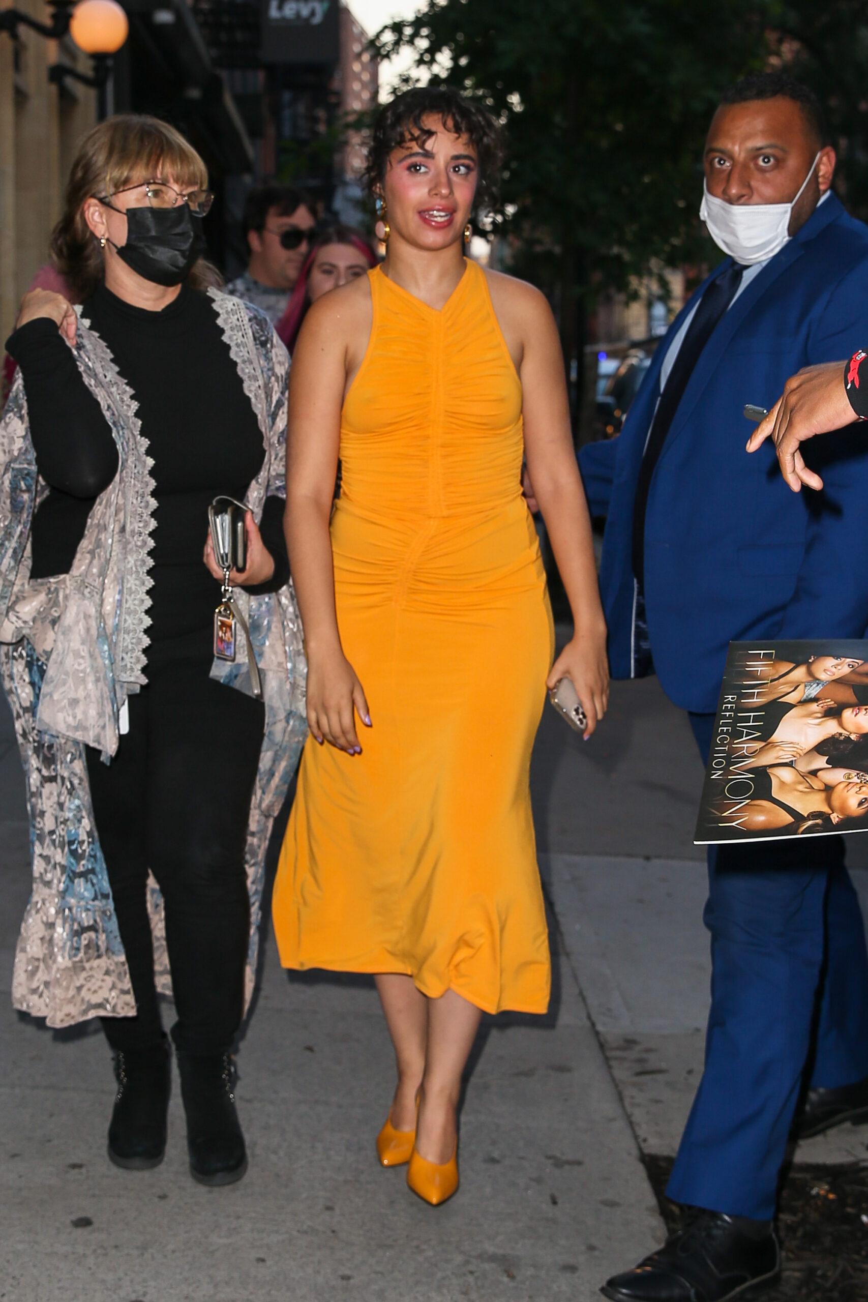 Camila Cabello wore a yellow dress while out and about in New York City