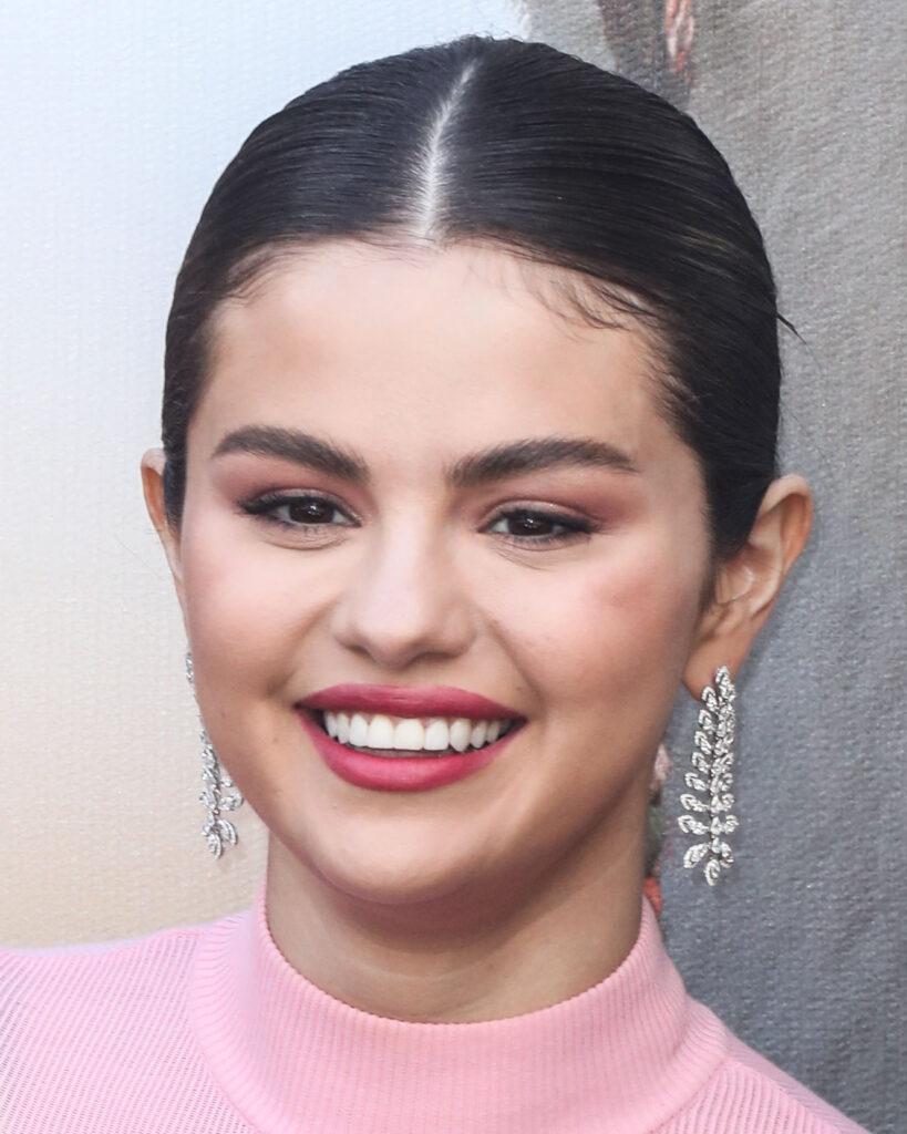 A photo of Selena Gomez smiling beautifully.