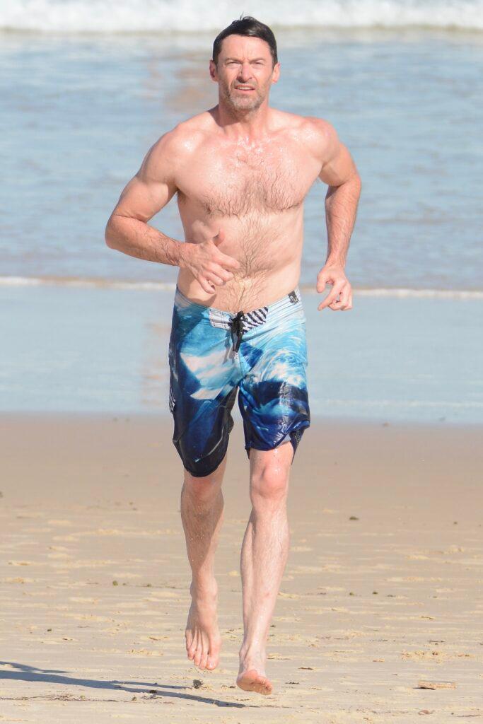 Hugh Jackman goes for a swim at Bondi ahead of concert tonight