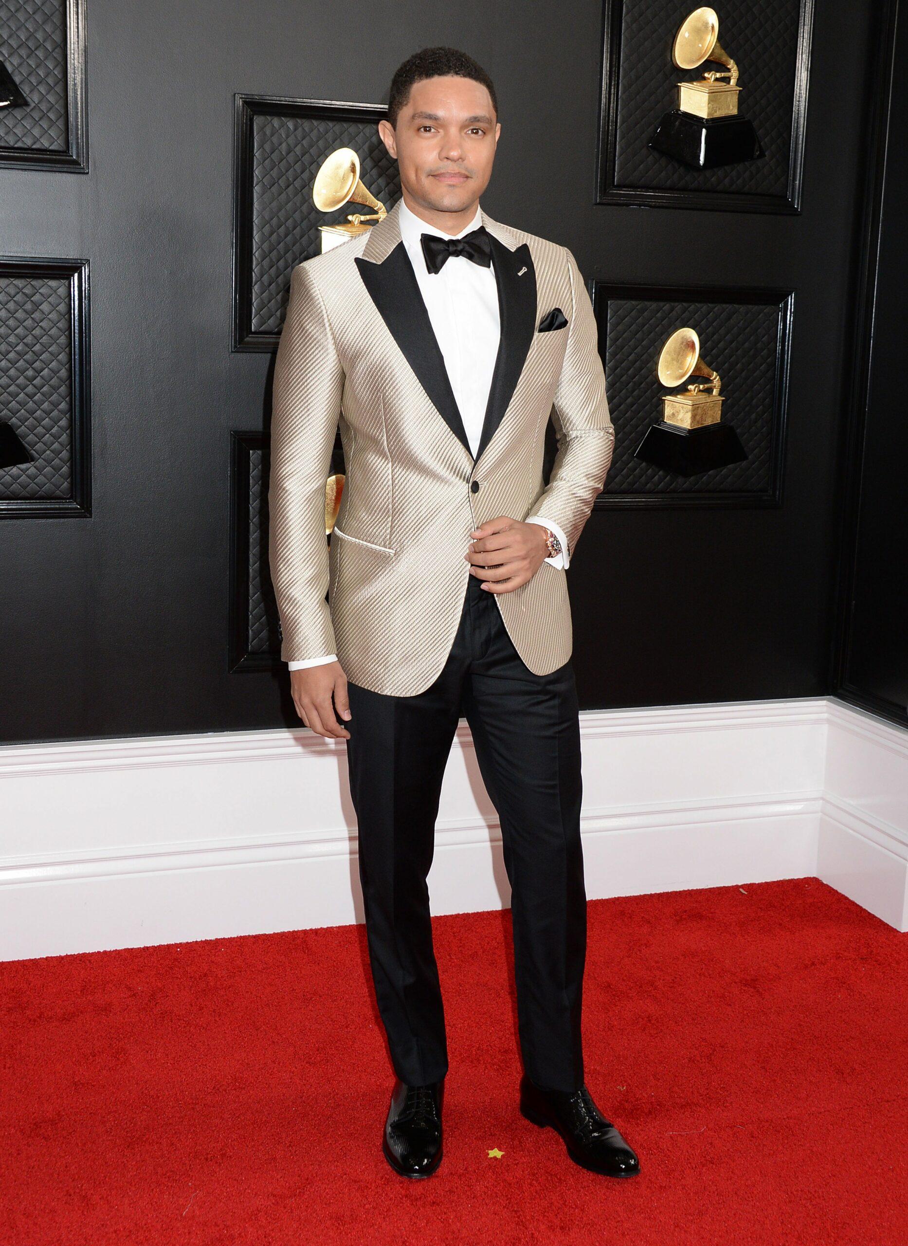 Trevor Noah appears at the 62nd Grammy Awards in a gold suit