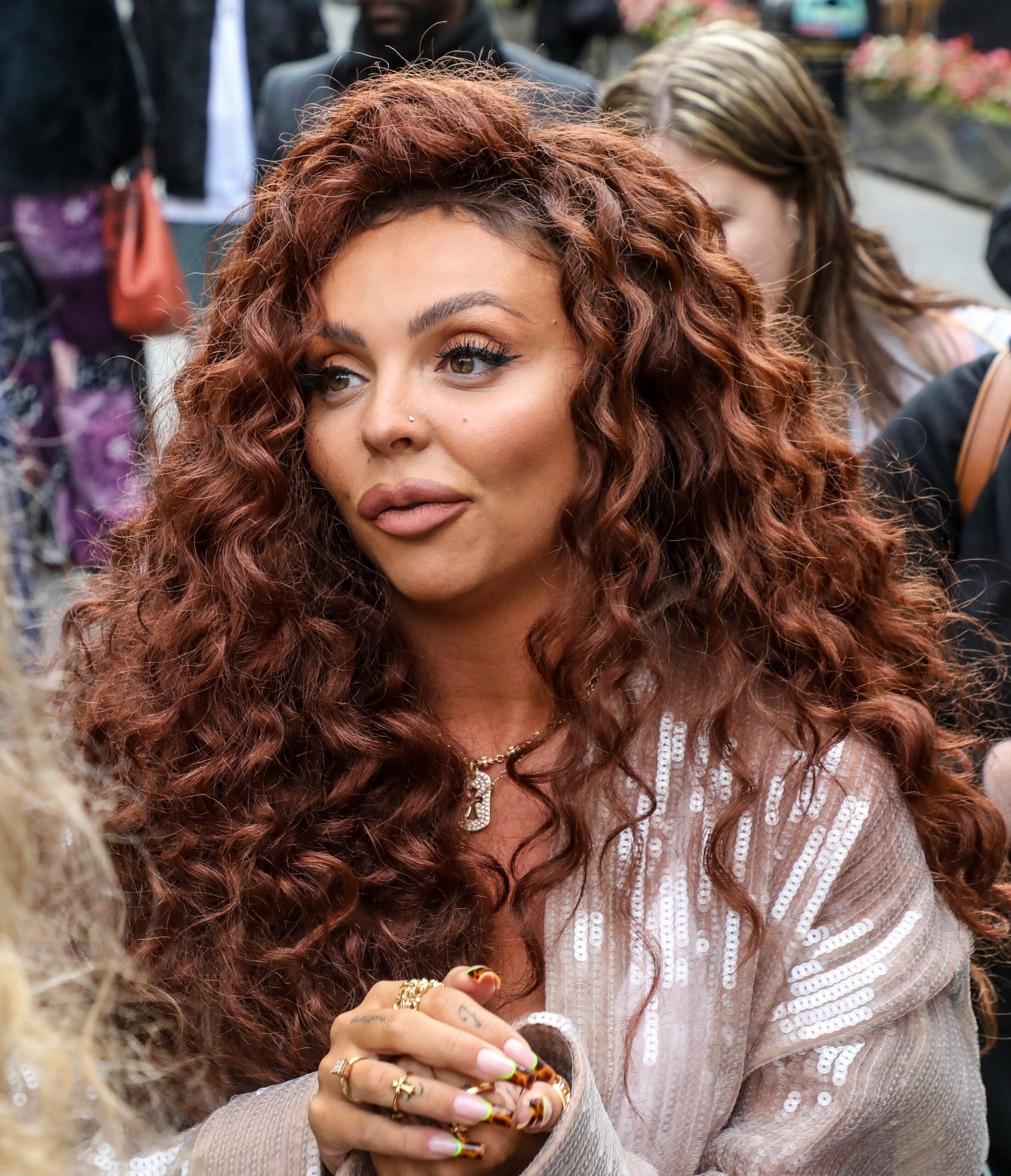 Jesy Nelson with brown curly hair 