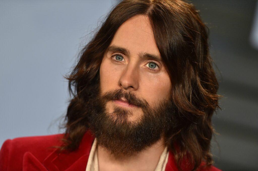 Jared Leto in red jacket