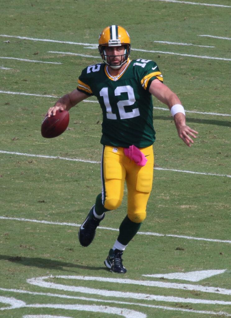 Aaron Rodgers playing football