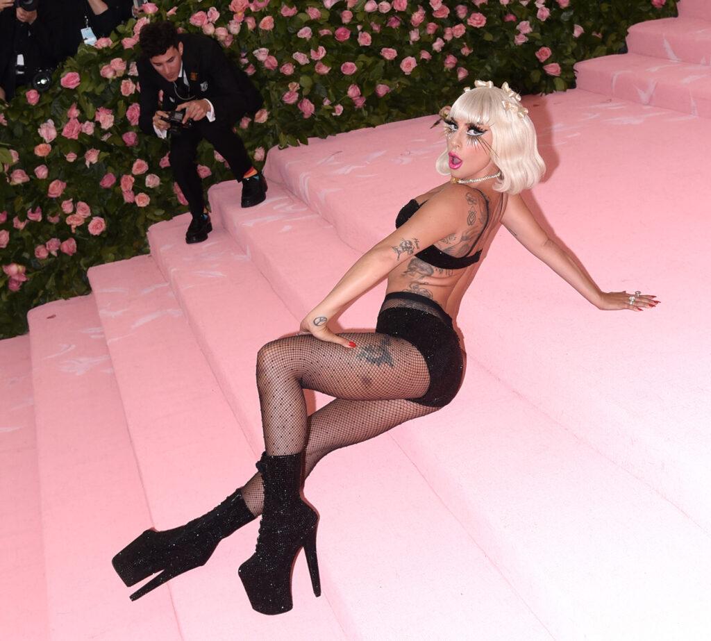 Gaga in fishnets and a bra