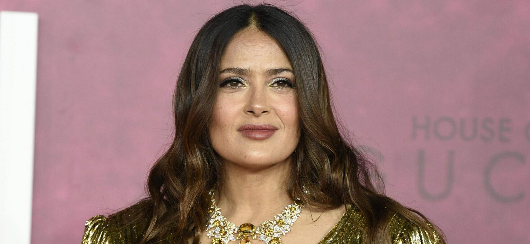 Salma Hayek Drinks Up In A Plunging Gucci Swimsuit