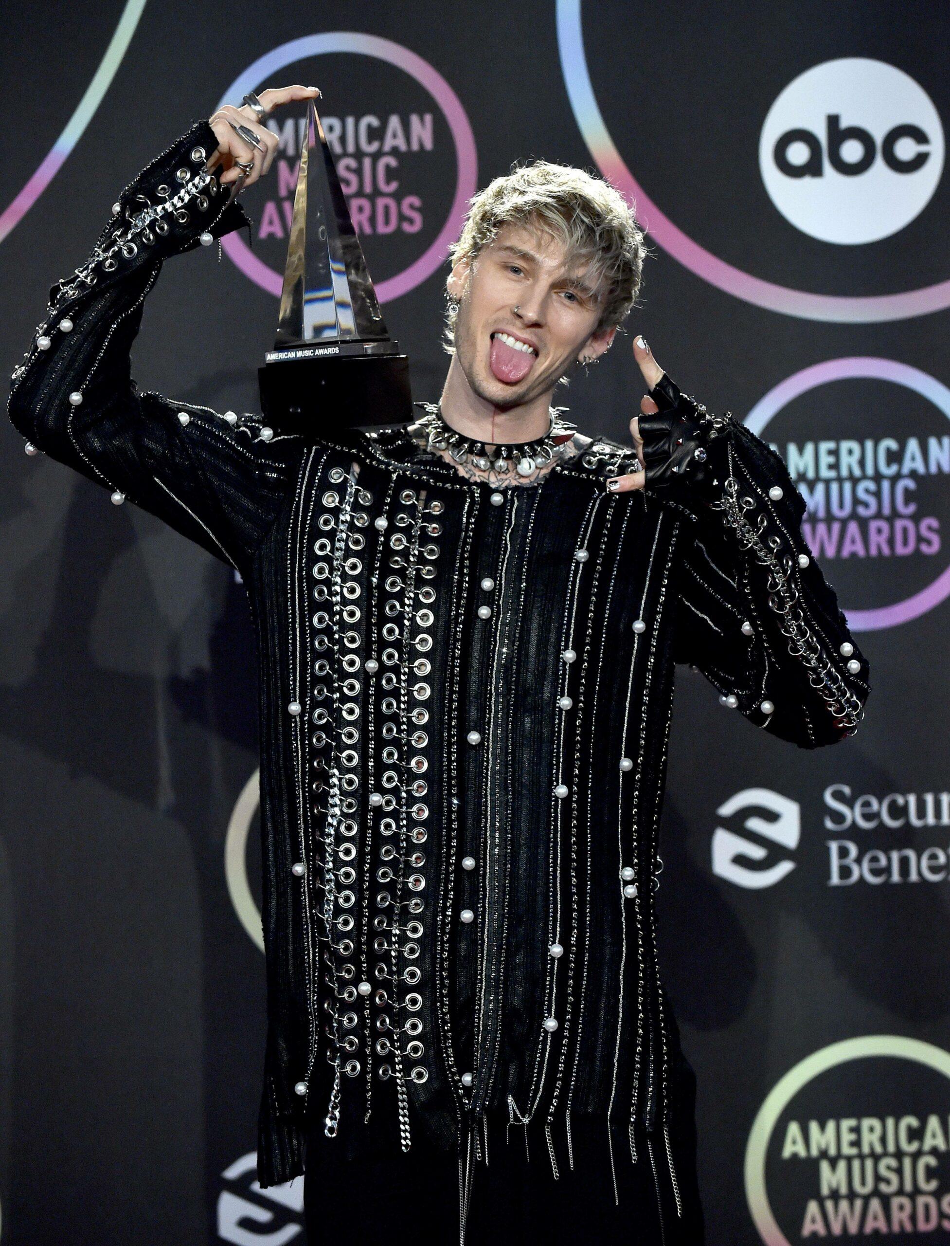 Machine Gun Kelly poses for the camera.