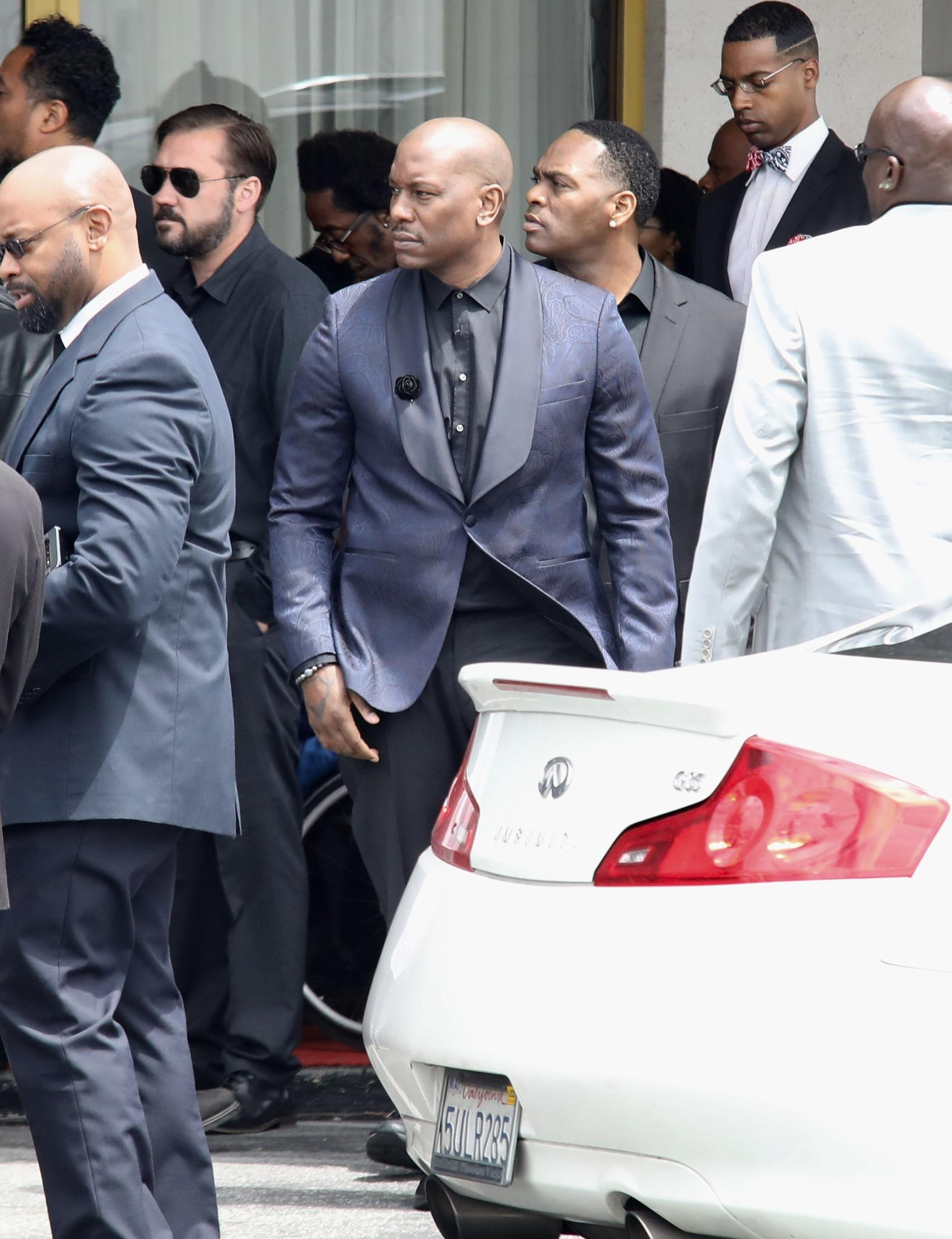 John Singleton family and friends pay tribute at private memorial