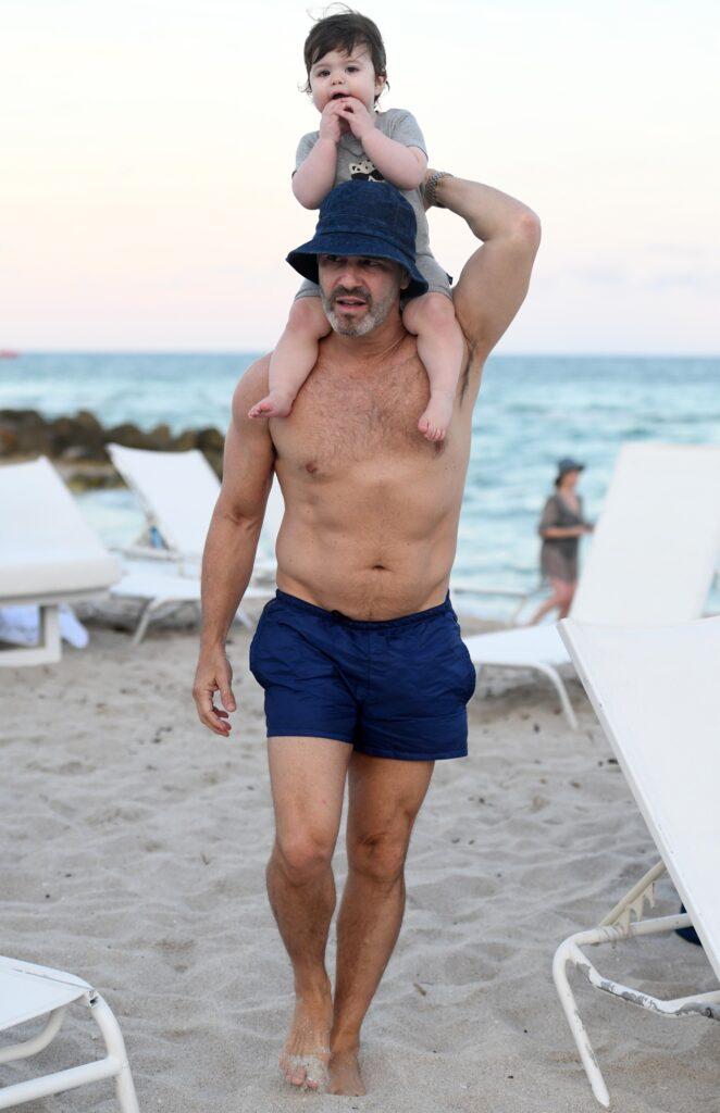 Andy Cohen shirtless on the beach with his son Benjamin in Miami
