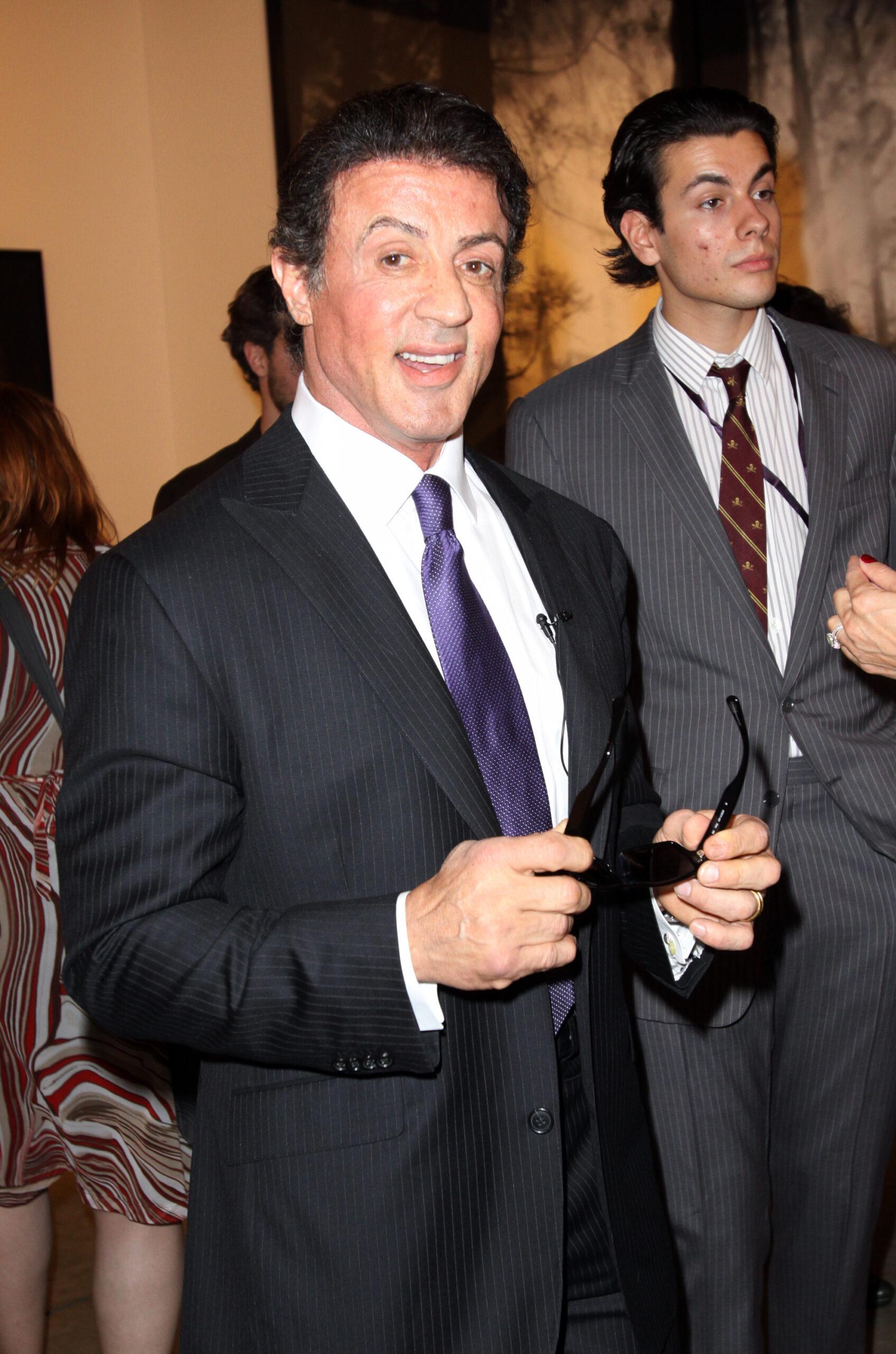 Sylvester Stallone and his wife Jennifer Flavin attend Art Basel Miami Beach where his artwork is on display