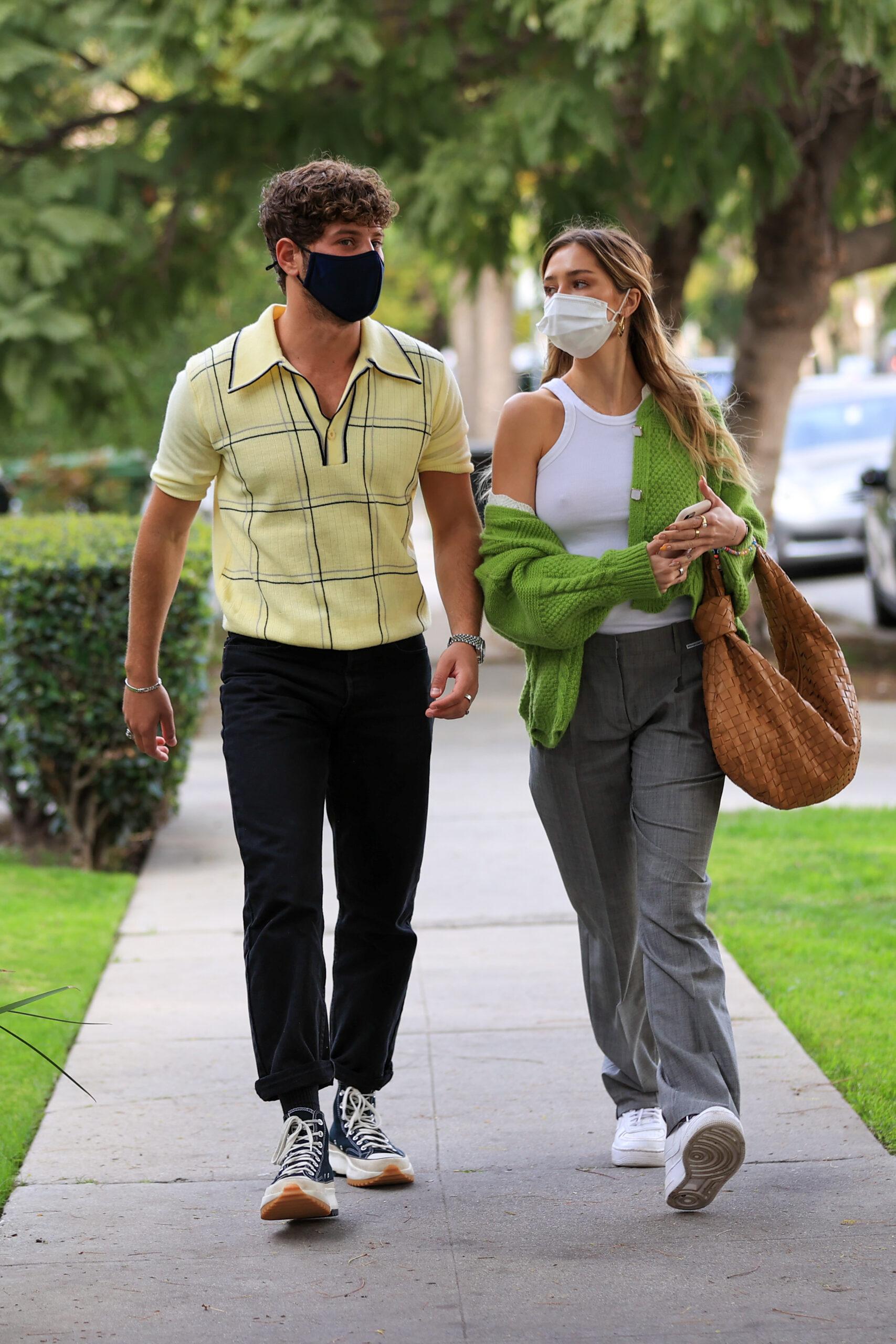 Adorable couple Delilah Belle Hamlin and Eyal Booker lock lips waiting for their coffee