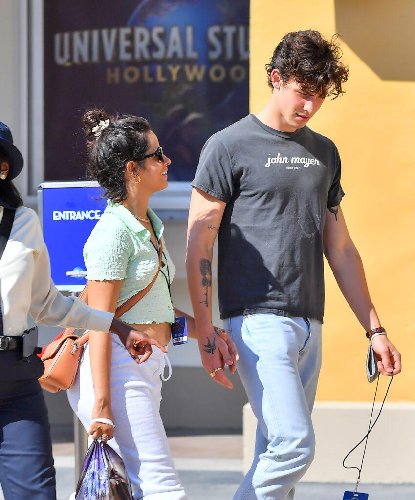 Shawn Mendes and Camilla Cabello hold hands as they enjoy a romantic day out at Universal Studios Hollywood