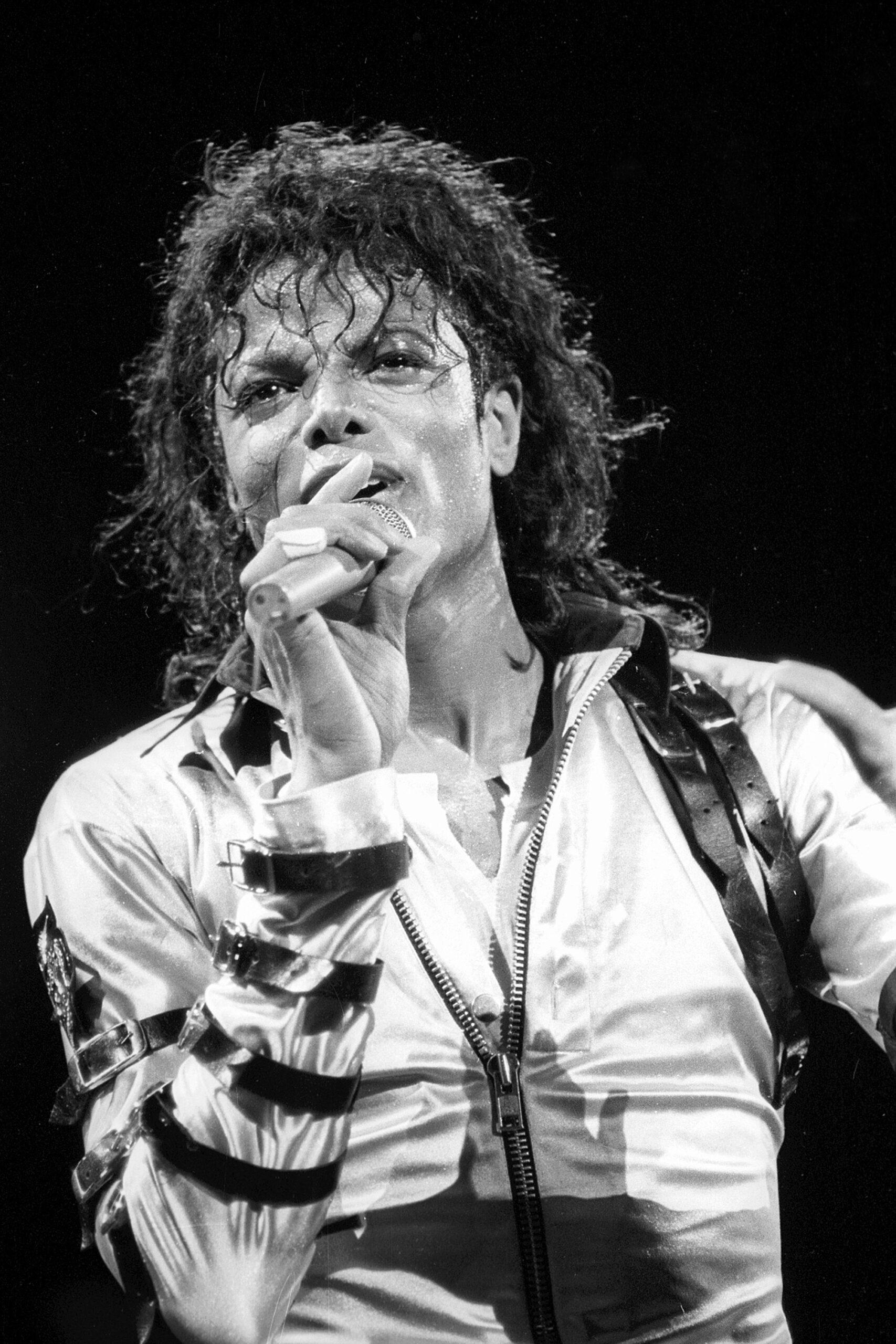 A photo of Micael Jackson performing on stage, and he looks amazing.