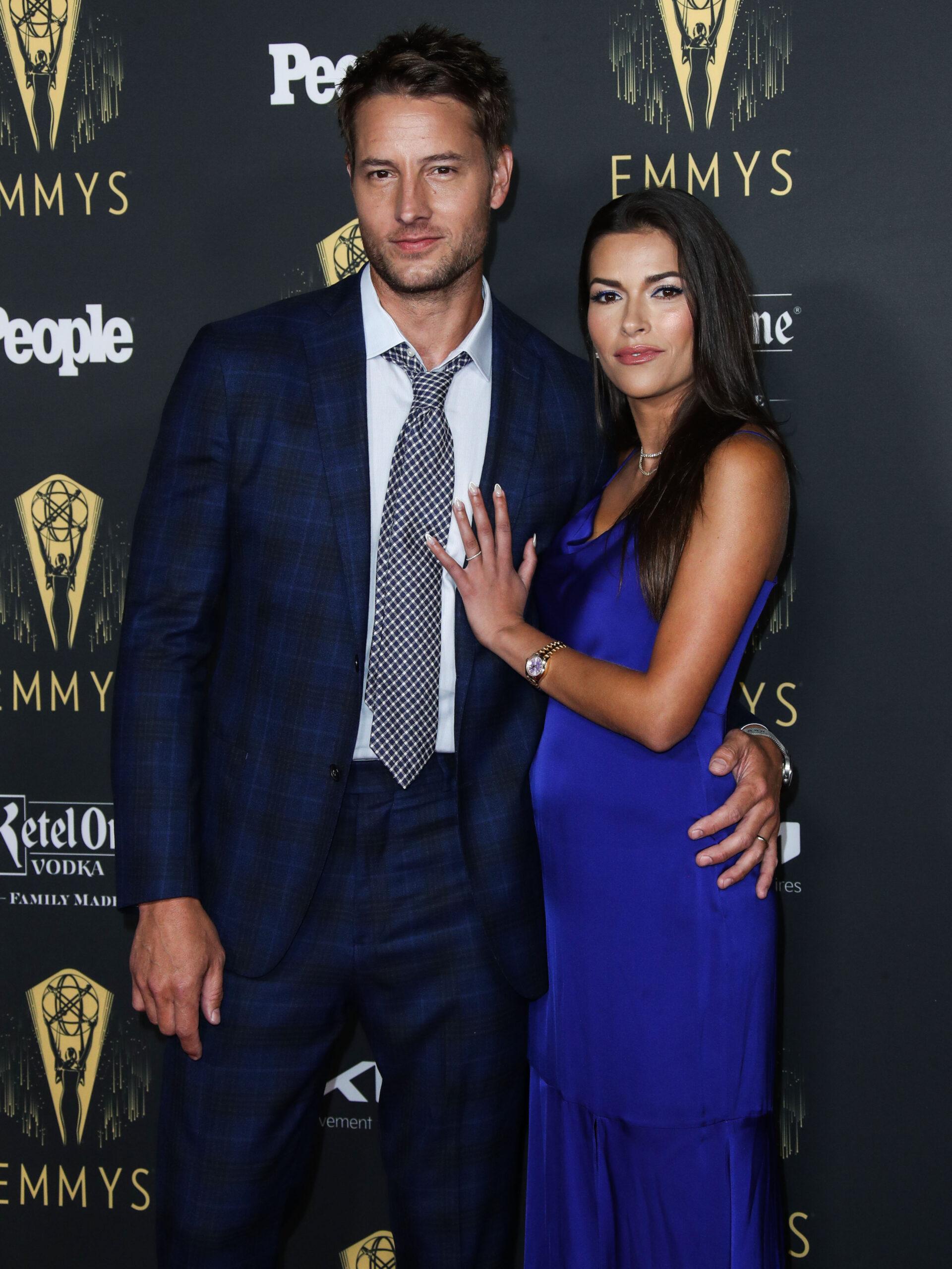 Justin Hartley and Sofia Pernas smiling