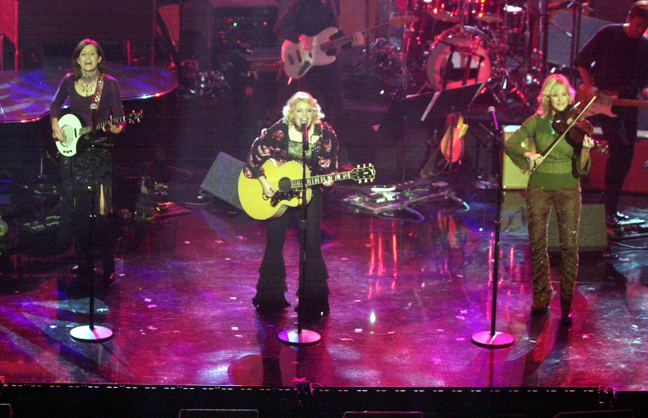 The Dixie Chicks; Emily Robison, Natalie Maines and Martie Seidel (L-R) pose backstage prior to the 2nd annual Women Rock! Girls and Guitars concert to raise awareness for breast cancer research 10/18/01 at the Wiltern Theatre in Los Angeles, California.