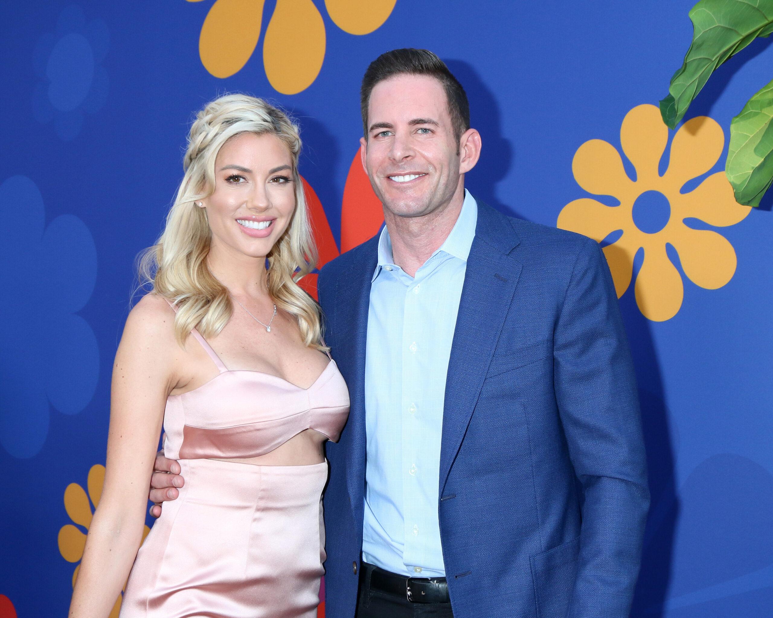 Heather Rae Young and Tarek El Moussa smiling