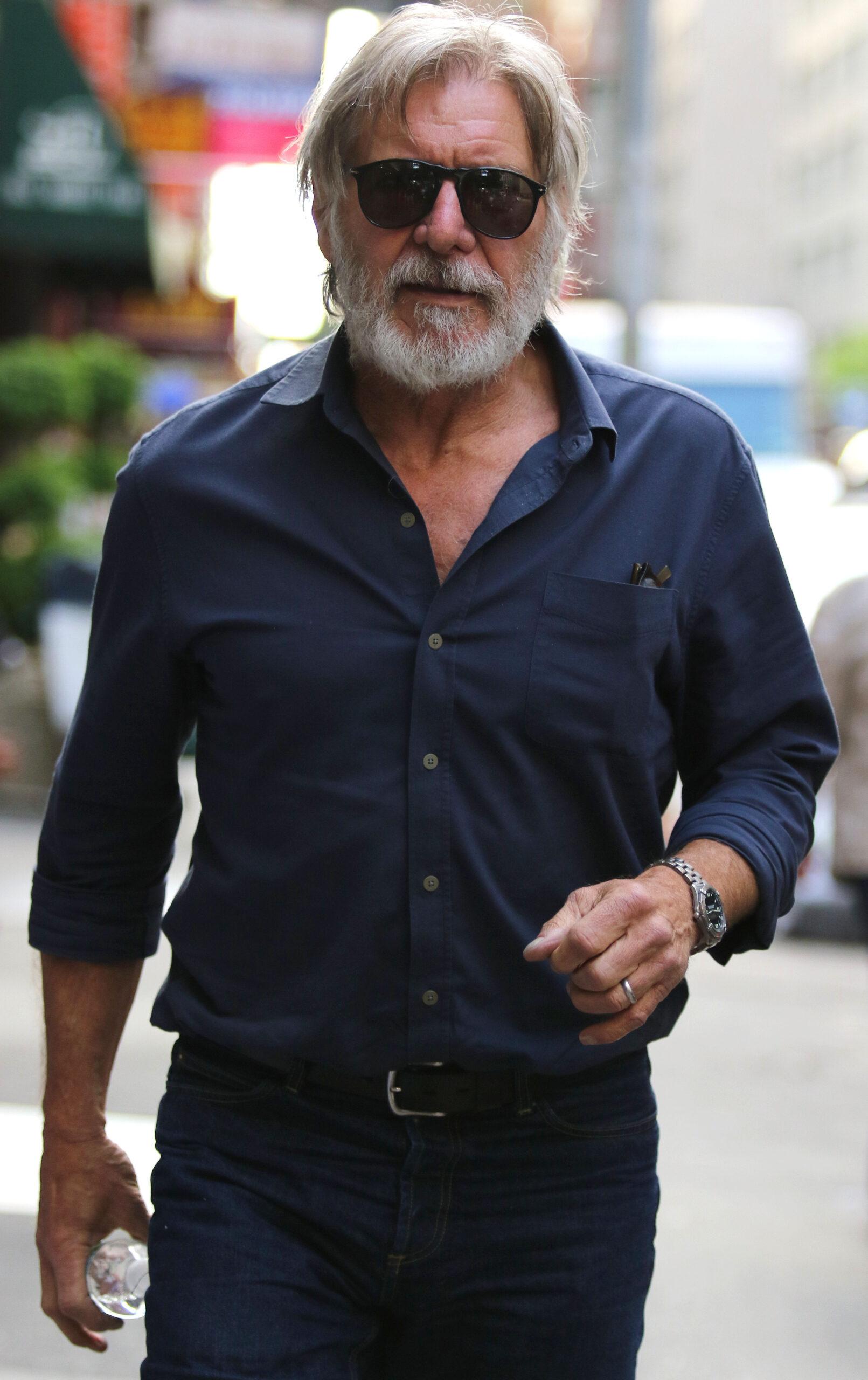 Harrison Ford looks nearly unrecognizable sporting a scruffy white beard in New York City