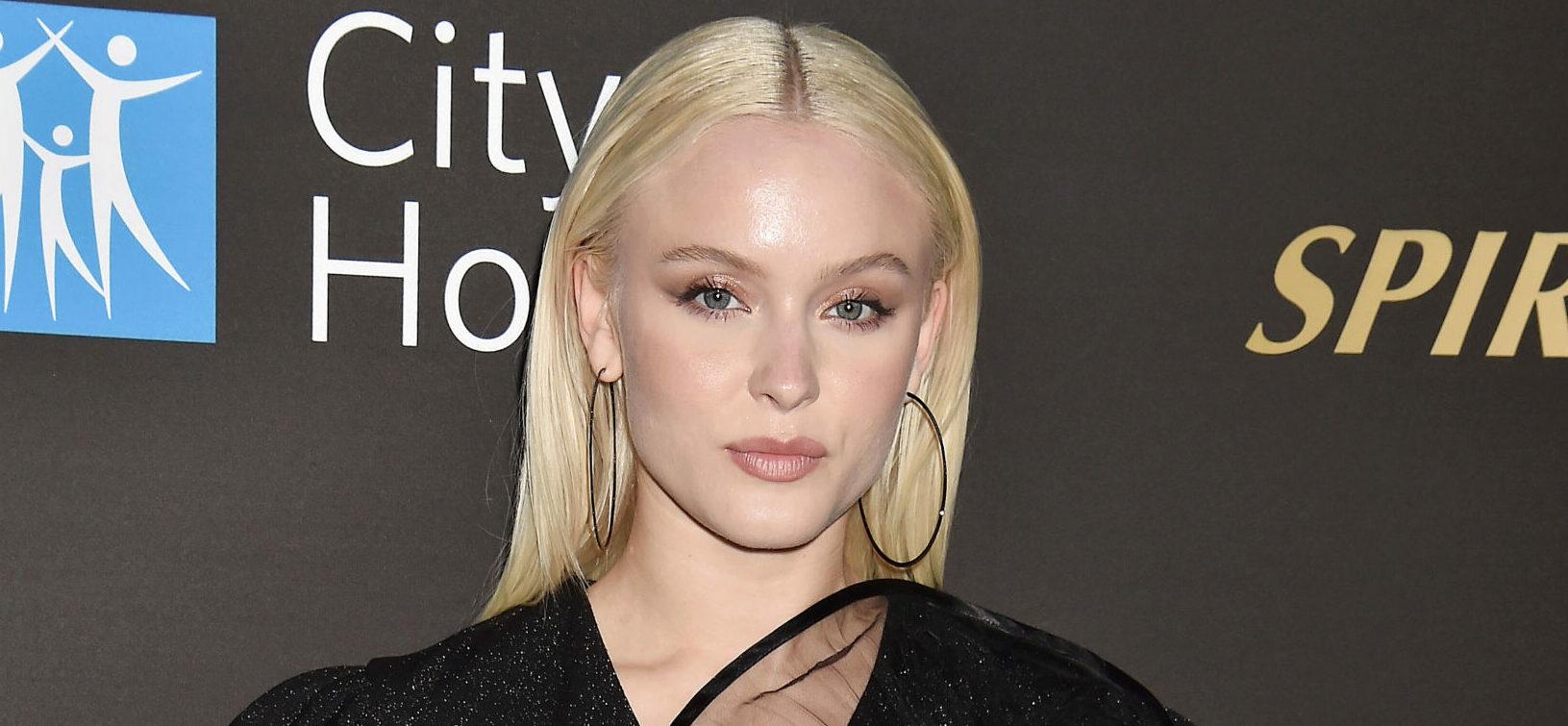 Zara Larsson Flaunts Chiseled Abs In Crop Top & Pleated Skirt