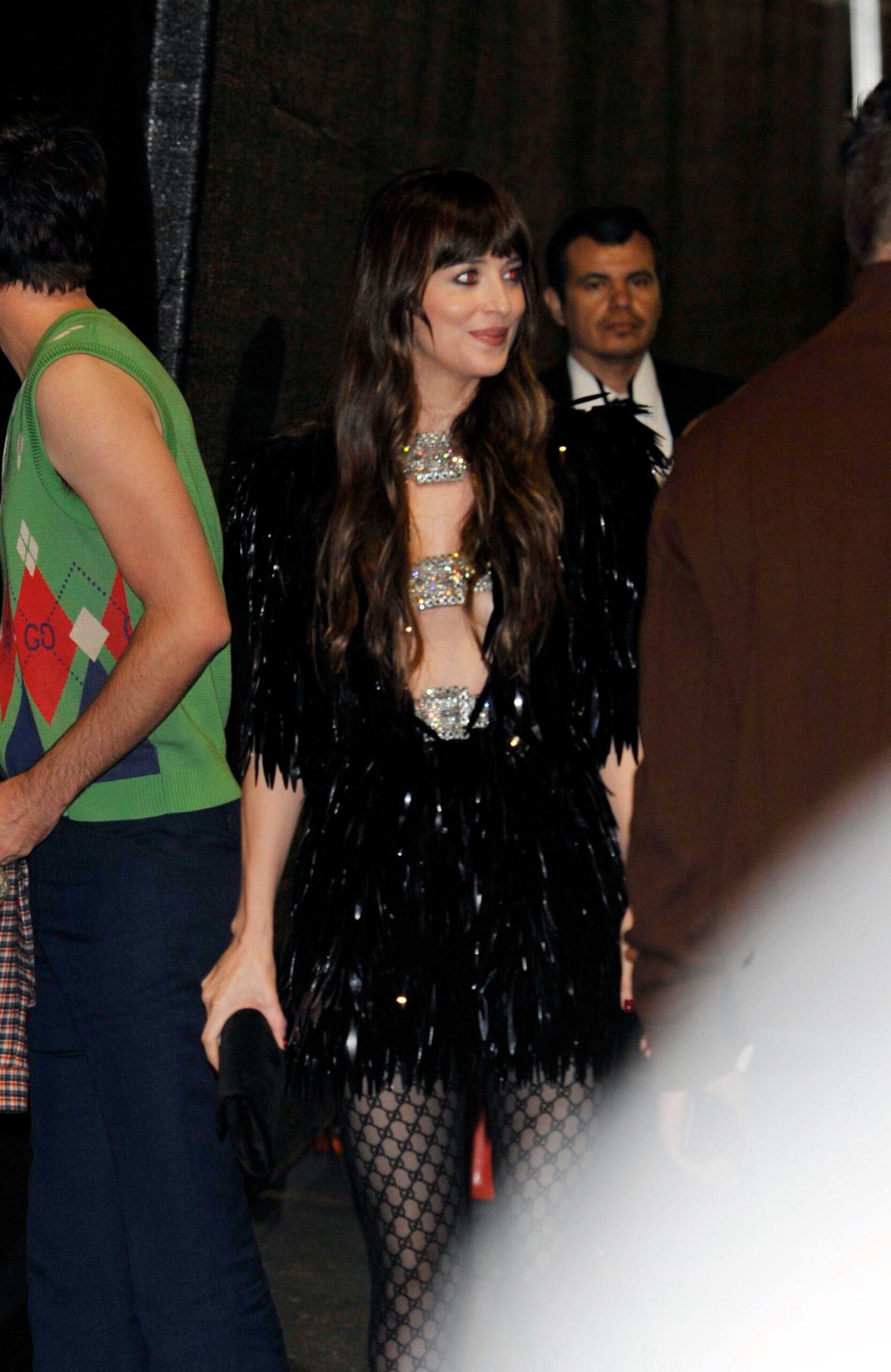 Dakota Johnson at the Gucci Love Parade down Hollywood Boulevard in Los Angeles