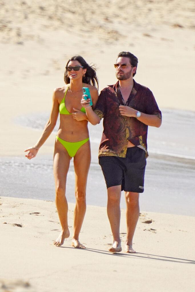 Scott Disick and model Bella Banos is seen strolling one of the beaches during holidays season in St-Barts