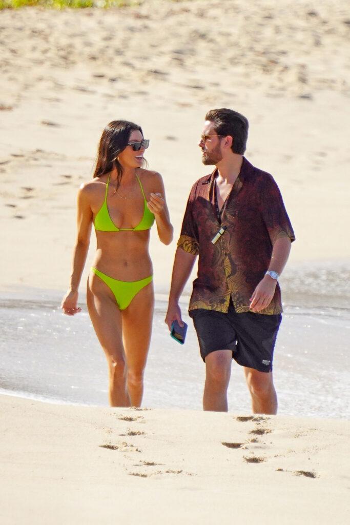 Scott Disick and Bella Banos are seen strolling on one the beaches during holidays season in St-Barts