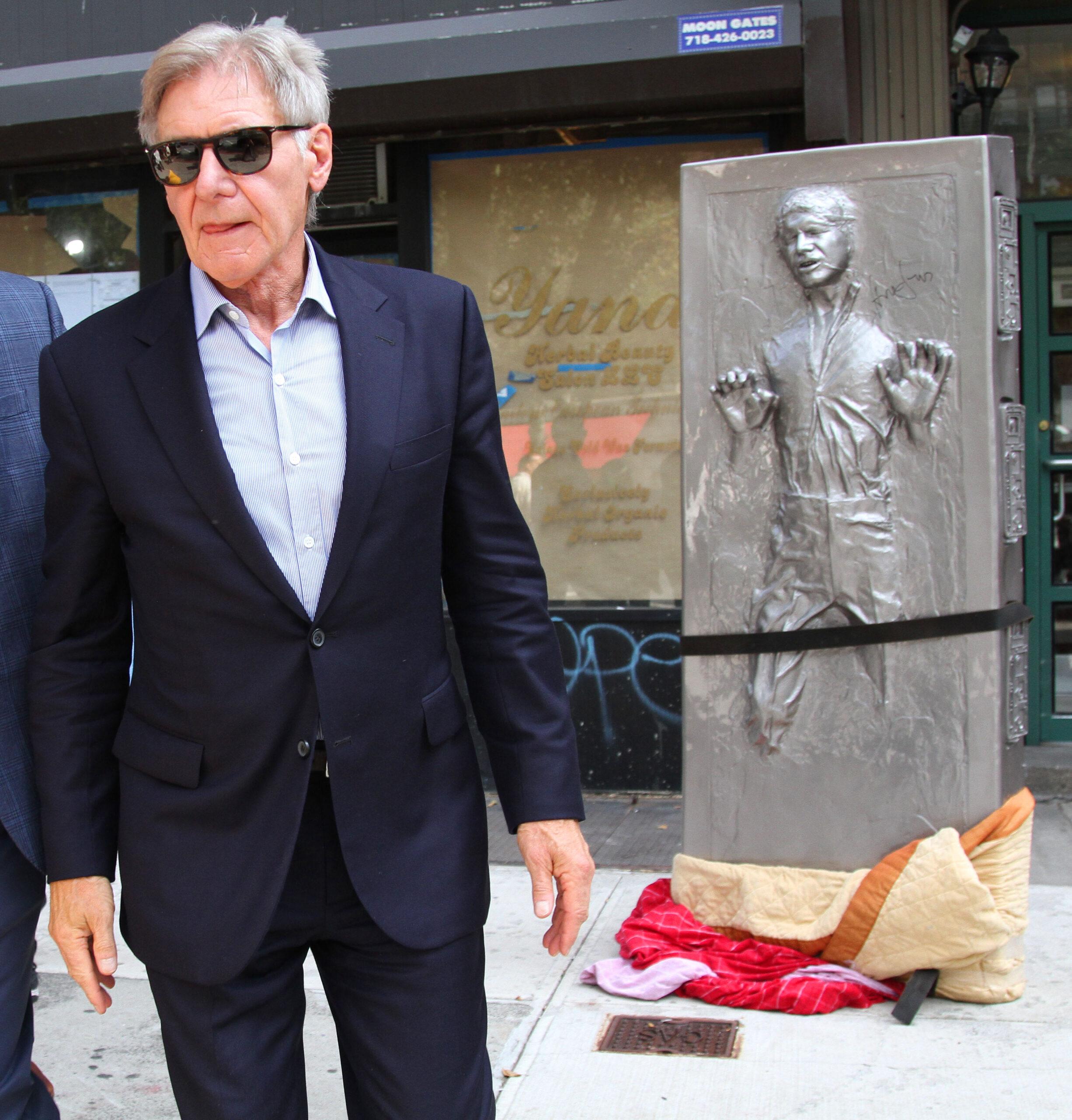 Harrison Ford signs Life-Size figure of Han Solo in Carbonite Statue and causes chaos with autograph collectors in NYC