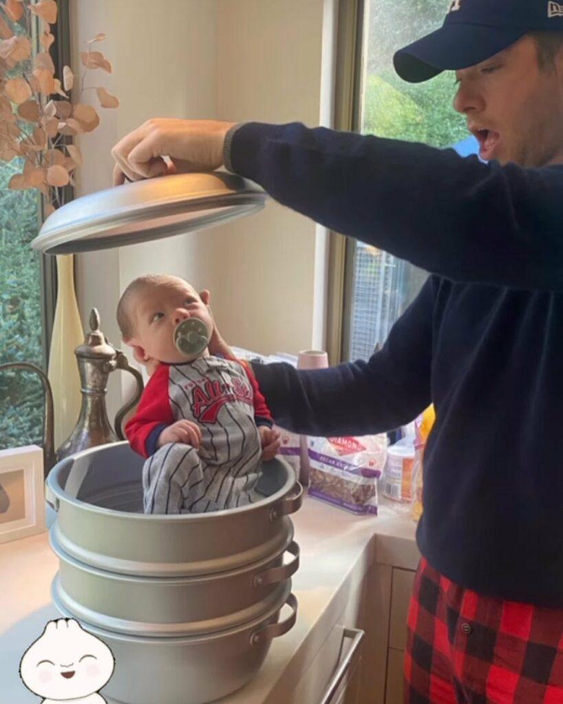 John Mulaney lowers baby into a pot
