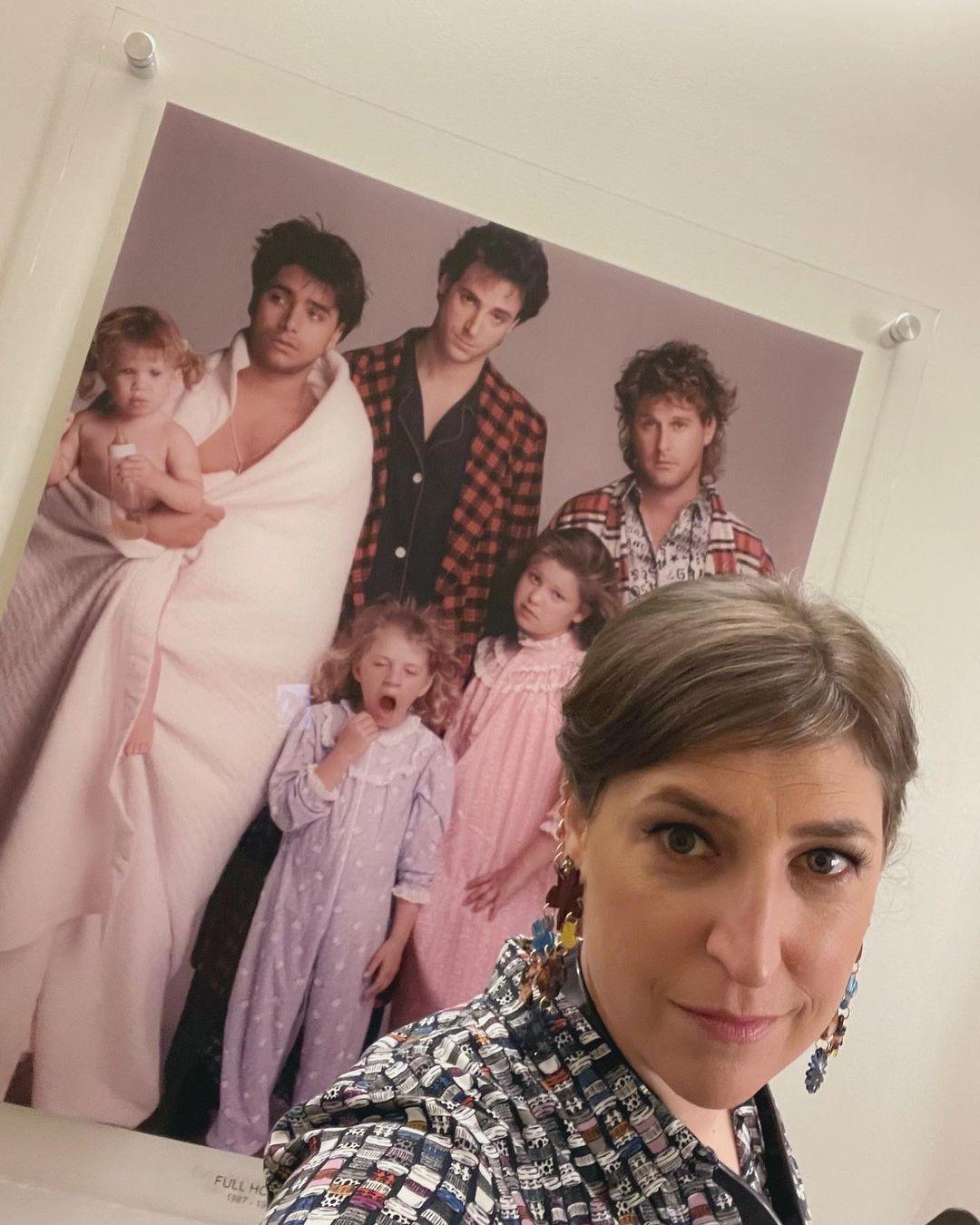 Mayim Bialik with Full House poster