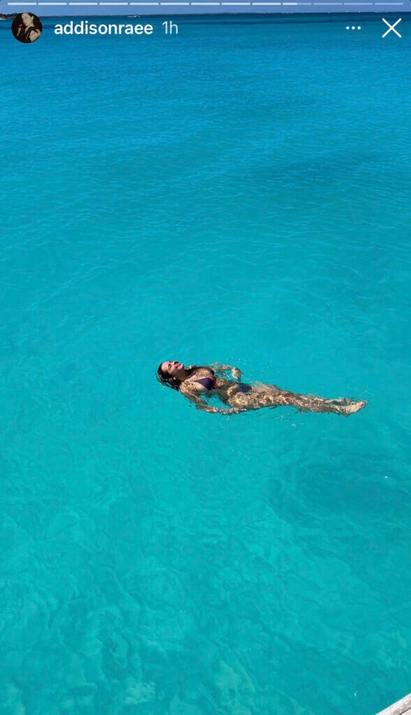 Addison Rae swimming.