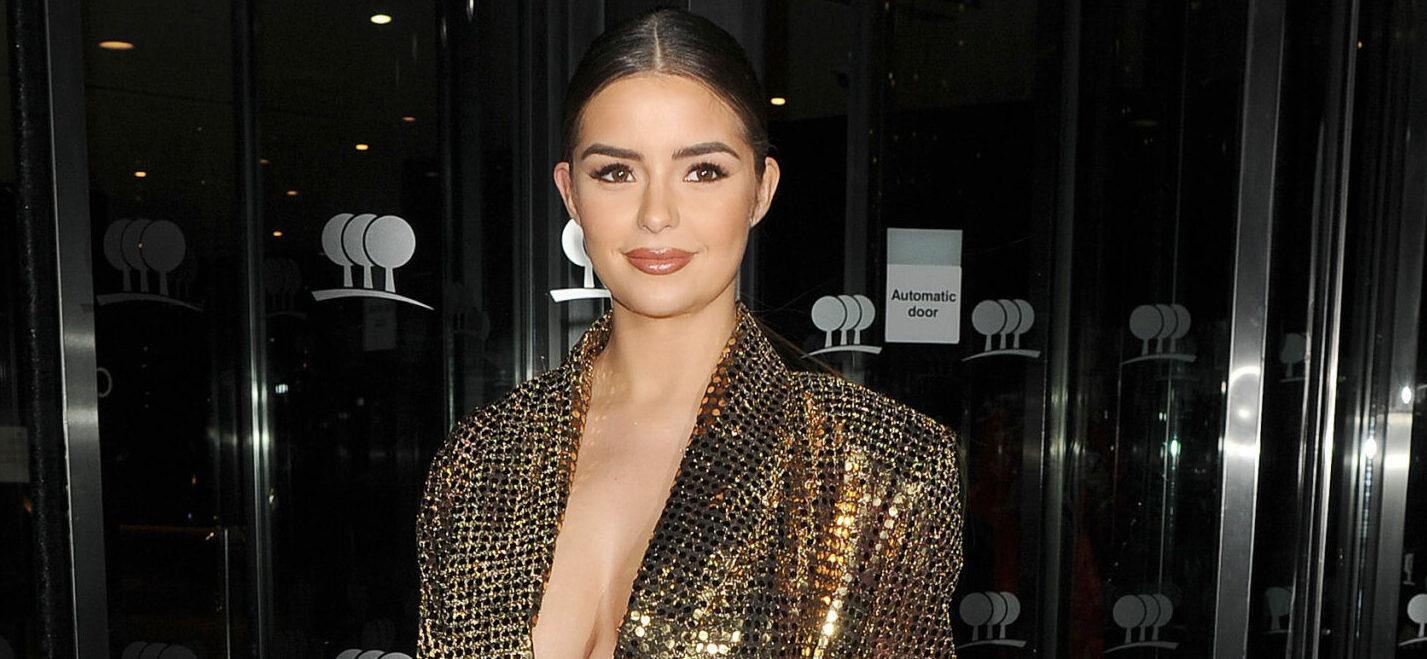 Demi Rose Goes On ‘Vacation Mode’ In Plunging Outfit
