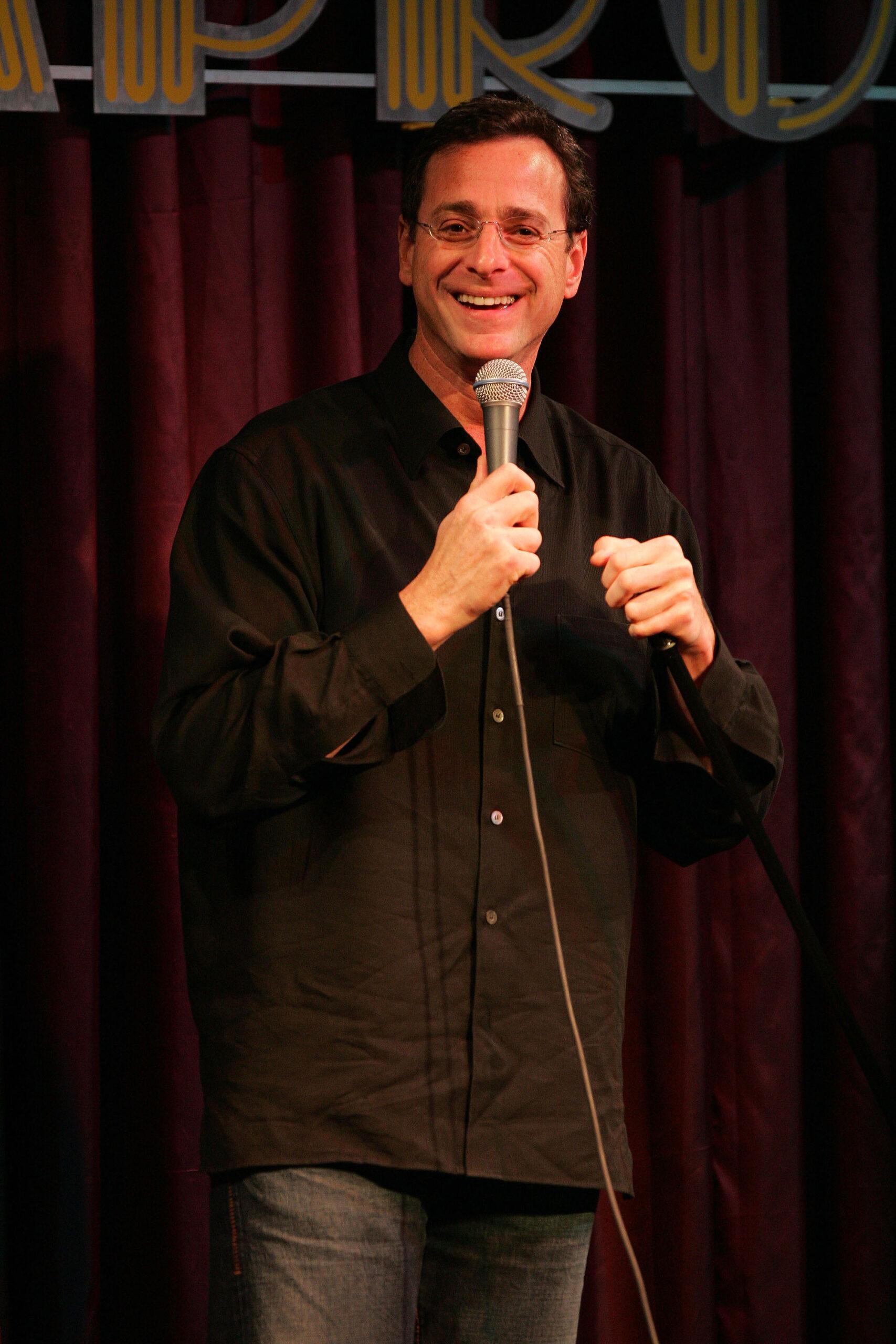 Bob Saget performs at the Improv Comedy Club