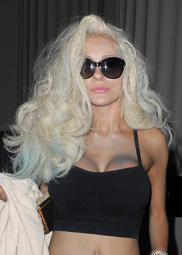 Courtney Stodden leaves a studio in Belgravia after a 14 hour photoshoot The model wore a typically revealing outfit and was covered in what appeared to be a blue coloured spray paint
