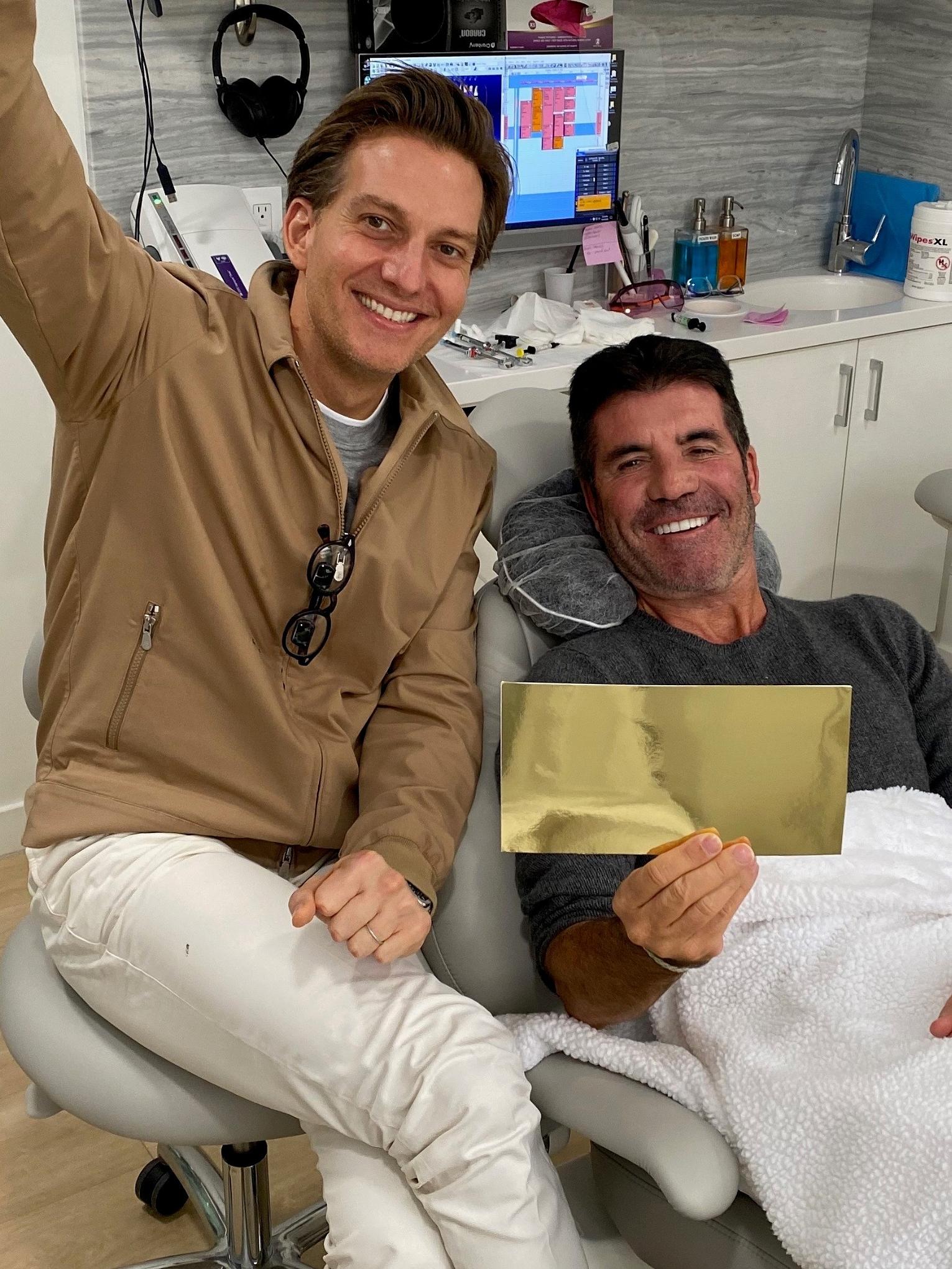 Simon Cowell shows off new teeth