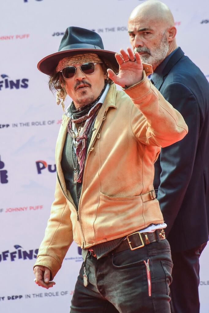Johnny Depp attends the red carpet of the movie quot Puffins quot with producers Andrea Iervolino and Monika Bacardi at the Rome Film Festival
