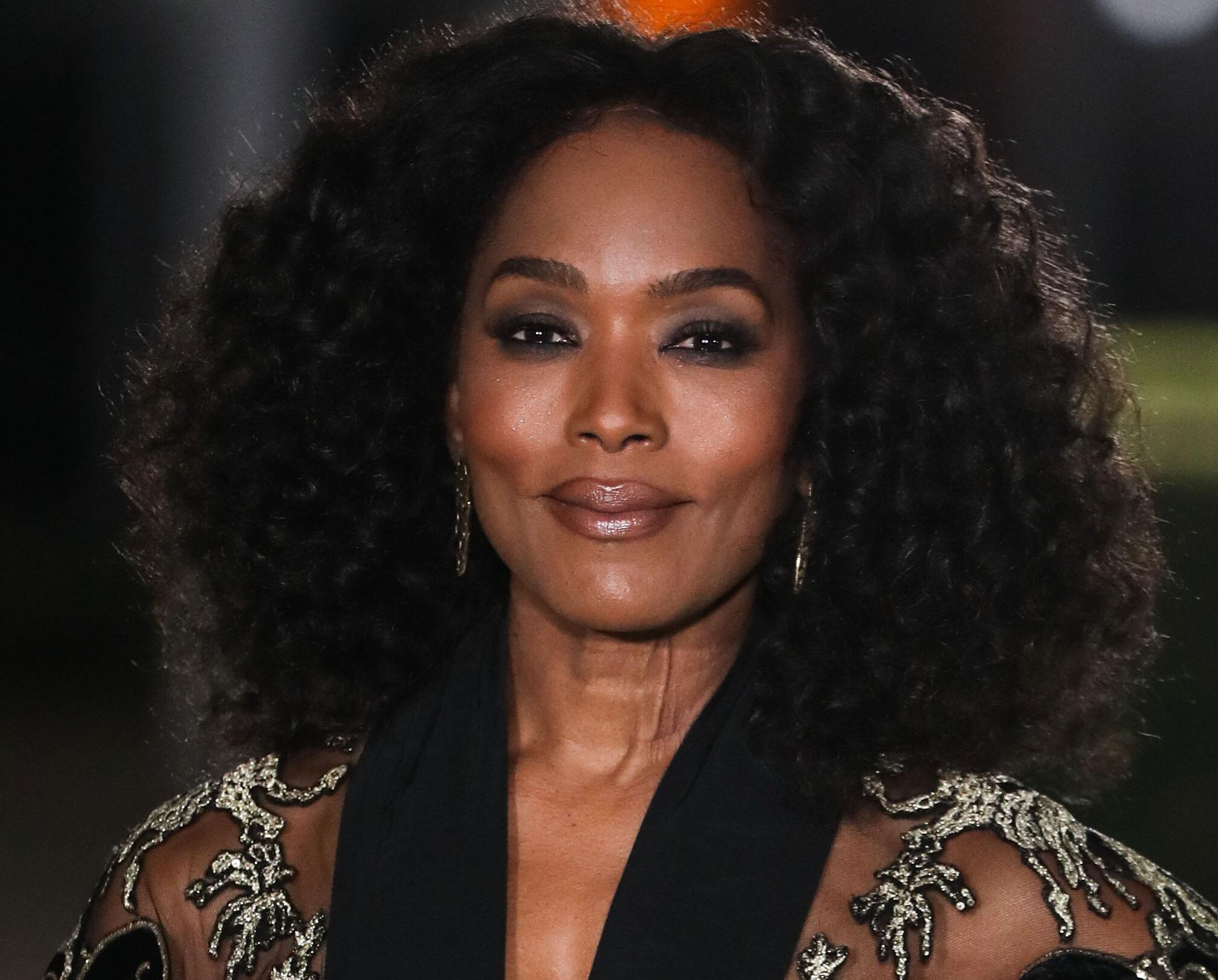 Actress Angela Bassett wearing an outfit by Elie Saab arrives at the Academy Museum of Motion Pictures